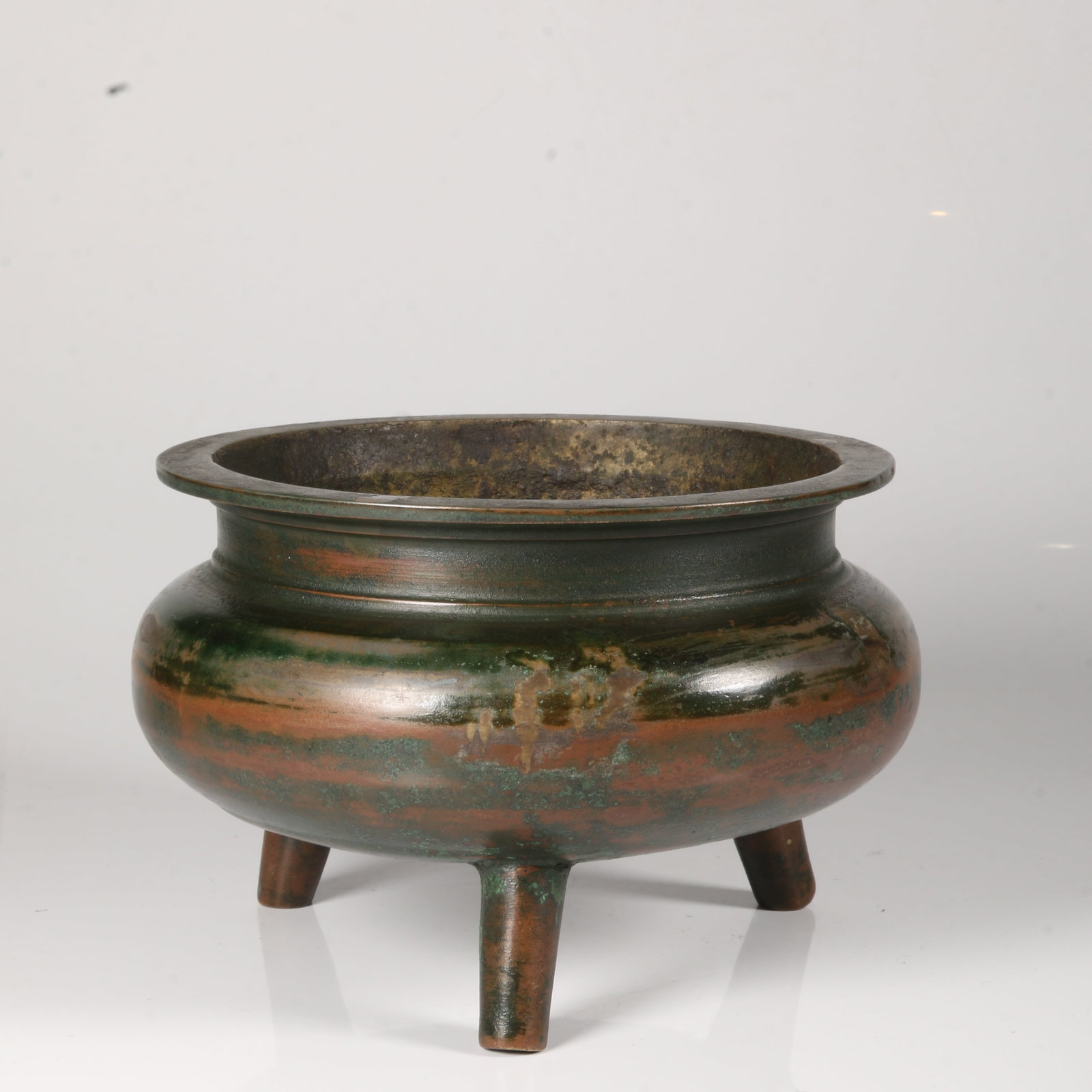 A BRONZE THREE-LEGGED CENSER (1 of 6)