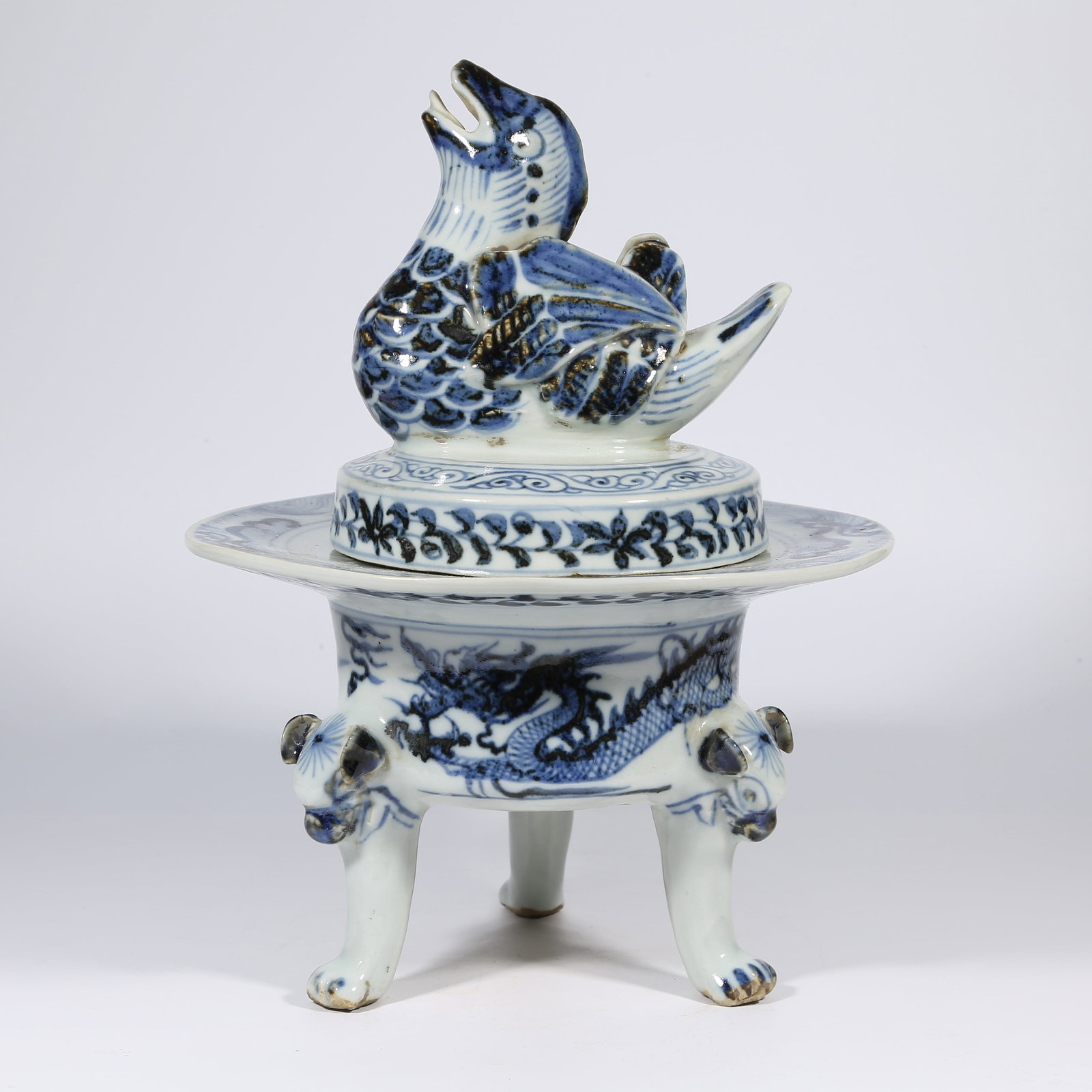 A BLUE-AND-WHITE INCENSE BURNER WITH DRAGON MOTIF AND MANDARIN DUCK FINIALS (1 of 9)