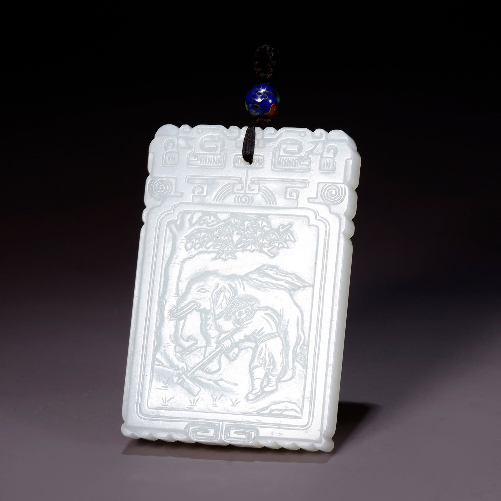 A HETIAN JADE "PEACE AND PROSPERITY" ELEPHANT PATTERN PLAQUE (1 of 9)