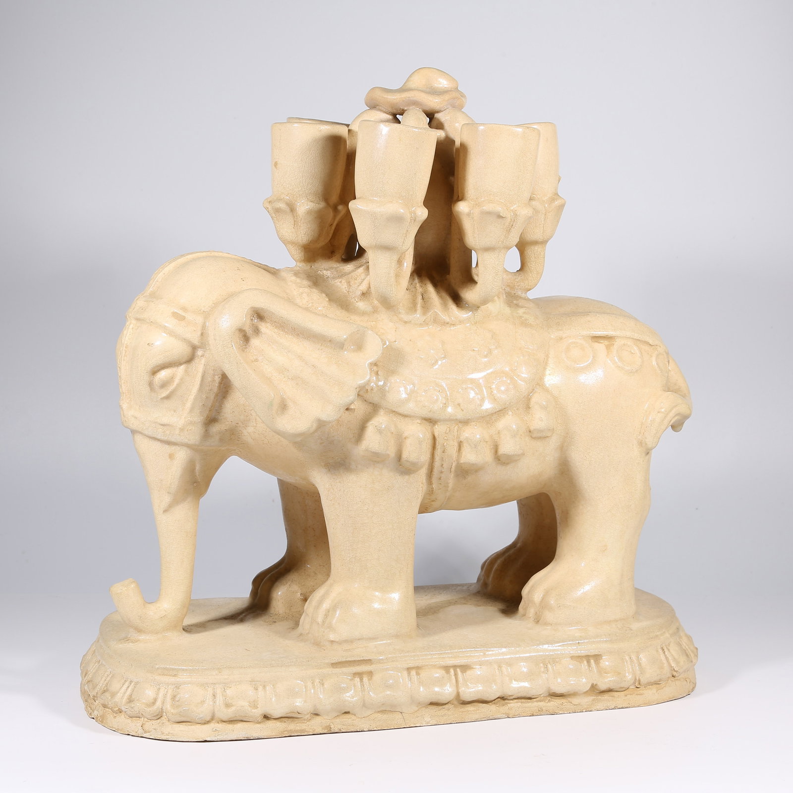 A WHITE POTTERY "PEACE AND PROSPERITY WITH ELEPHANT" CANDLESTICK (1 of 10)