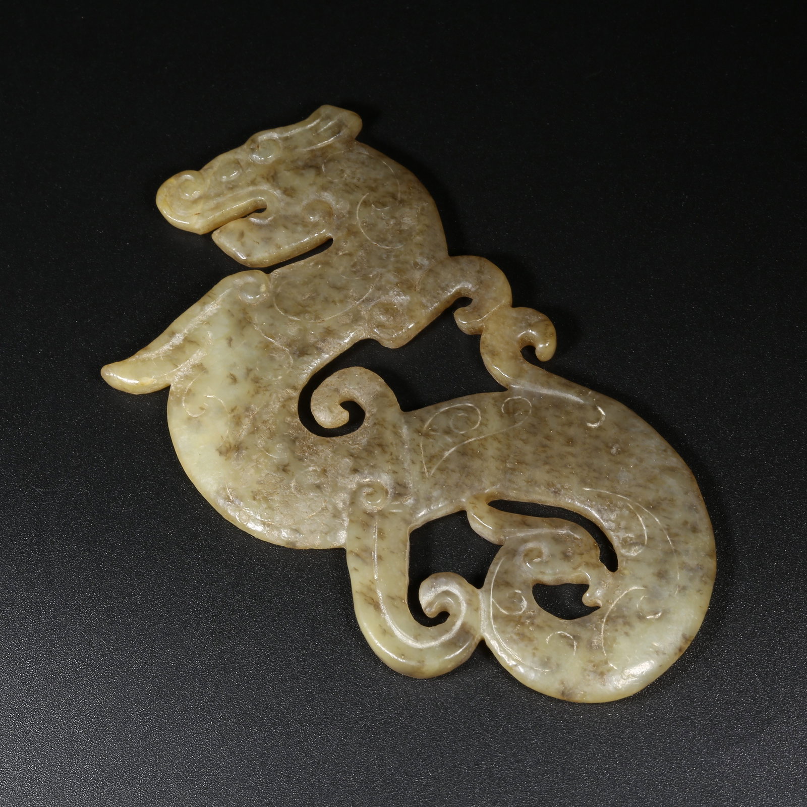 A ANCIENT JADE S-DRAGON PENDANT (1 of 10)