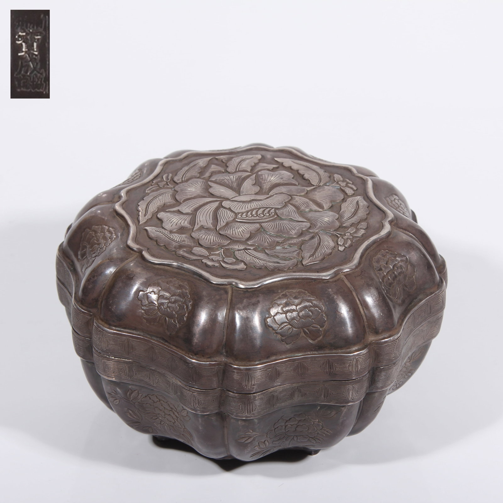 A SILVER COVERED BOX WITH FLORAL MOTIF (1 of 6)