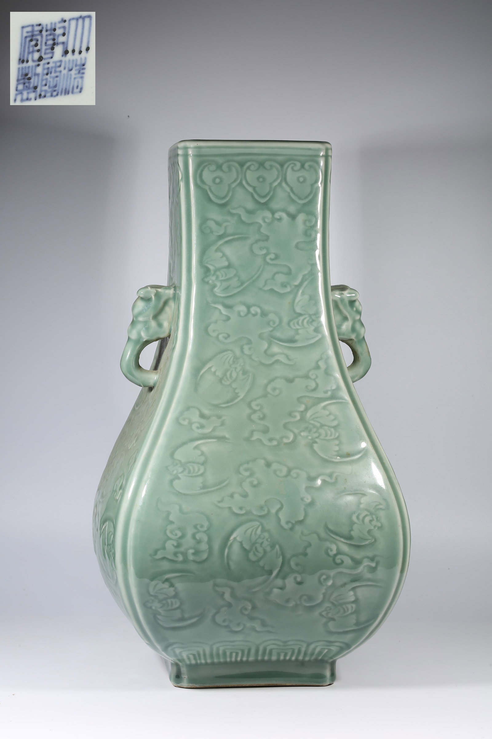 A FENCAI GLAZE BEAST-HANDLED ZUN WITH INCISED FLOATING CLOUD PATTERN: Fencai Glaze Beast-Handled Zun with Incised Floating Cloud Pattern