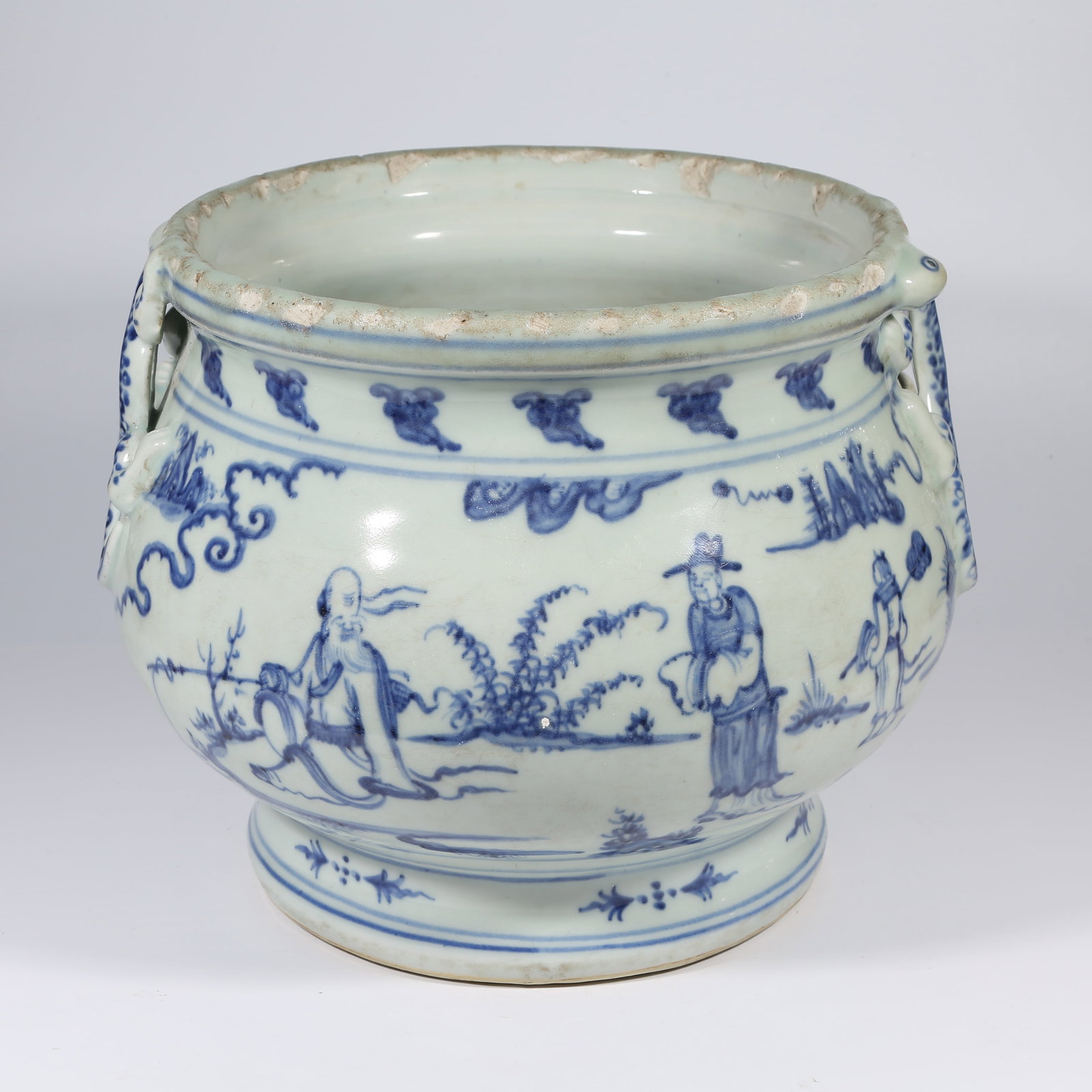 A BLUE-AND-WHITE INCENSE BURNER WITH NARRATIVE FIGURES AND CHI-DRAGON HANDLES: Blue-and-White Incense Burner with Narrative Figures and Chi-Dragon Handles