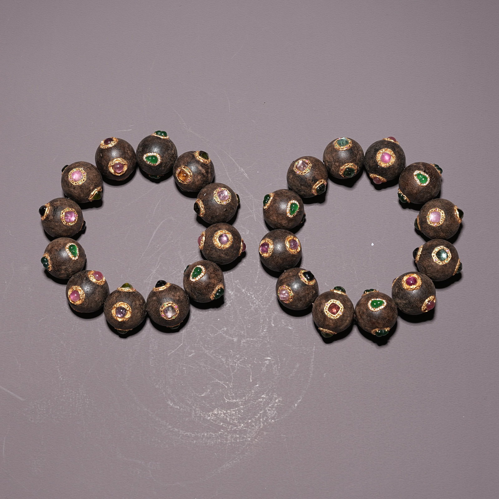 A SET OF QINAN WRIST BEADS INLAID WITH TOURMALINE (1 of 8)