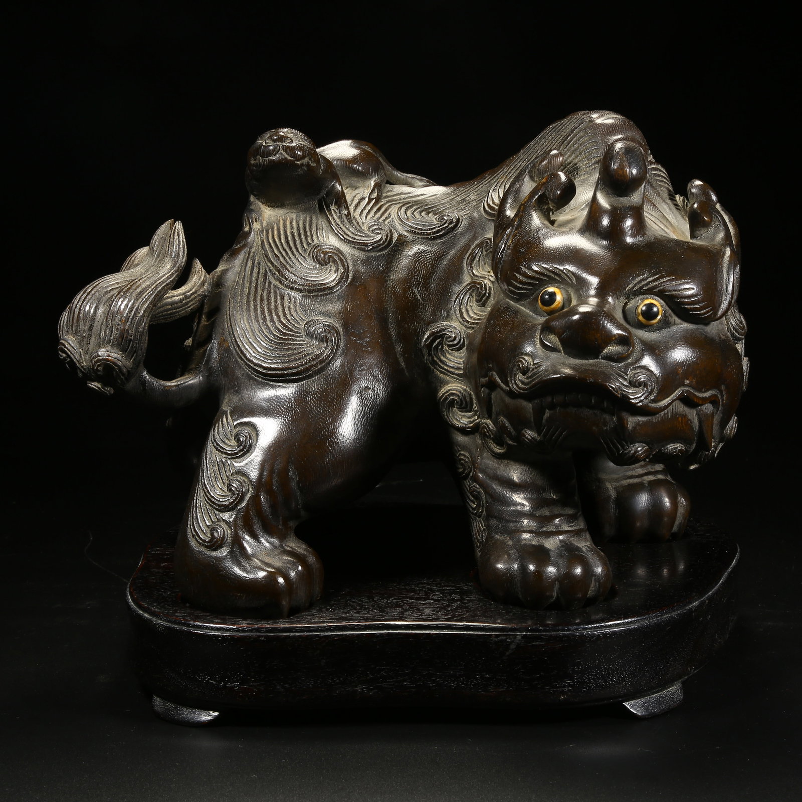 A AGARWOOD AUSPICIOUS BEAST FIGURINE (1 of 8)