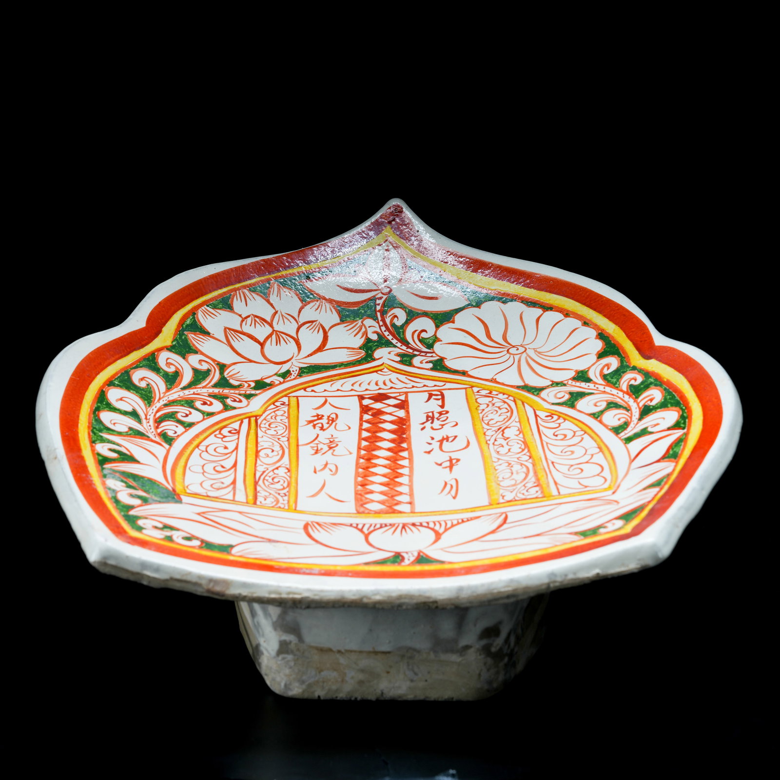 A SANCAI GLAZED PILLOW WITH FLORAL AND LOTUS PETAL MOTIFS (1 of 9)