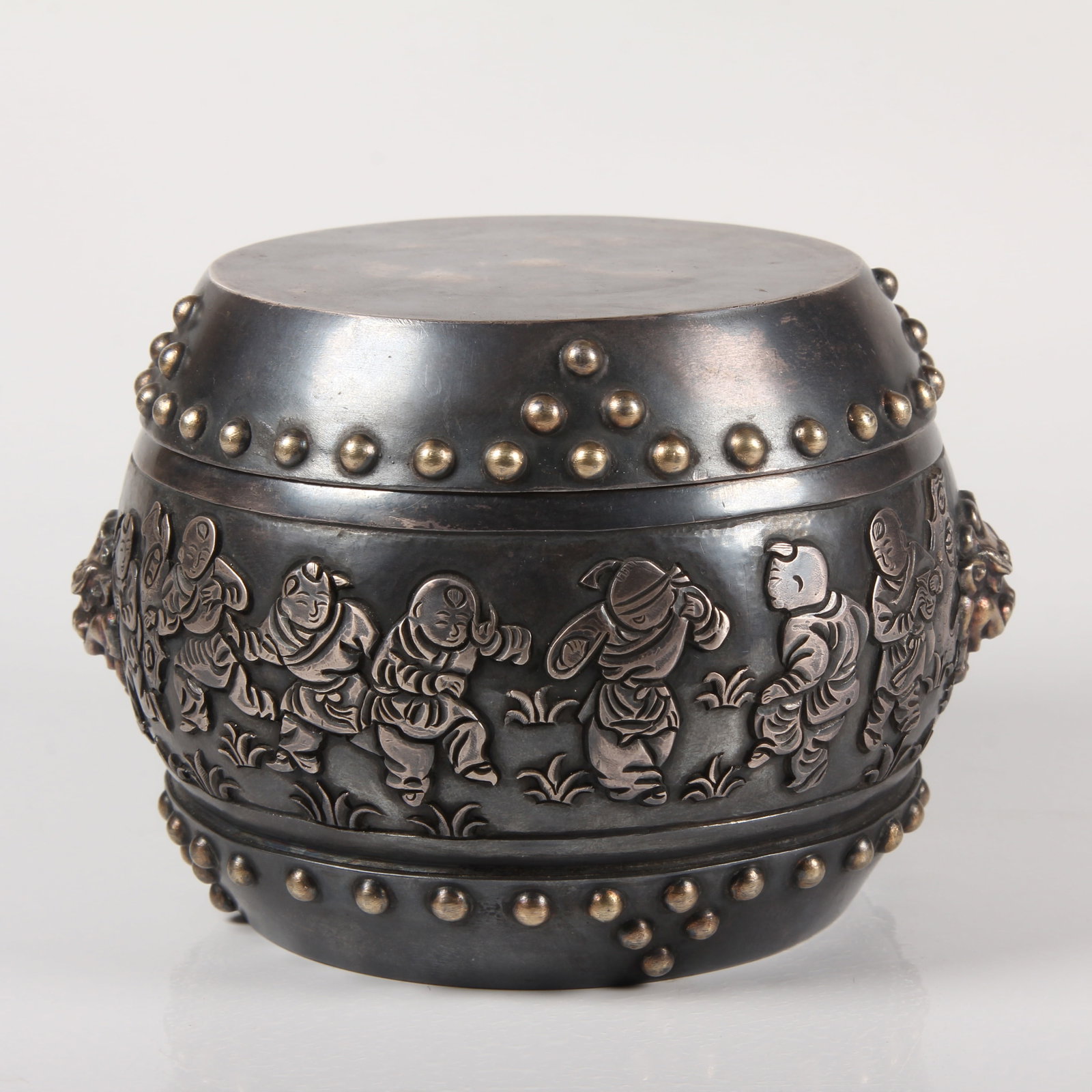 A SILVER DRUM-SHAPED WINE WARMER WITH BABY PLAY MOTIF (1 of 12)