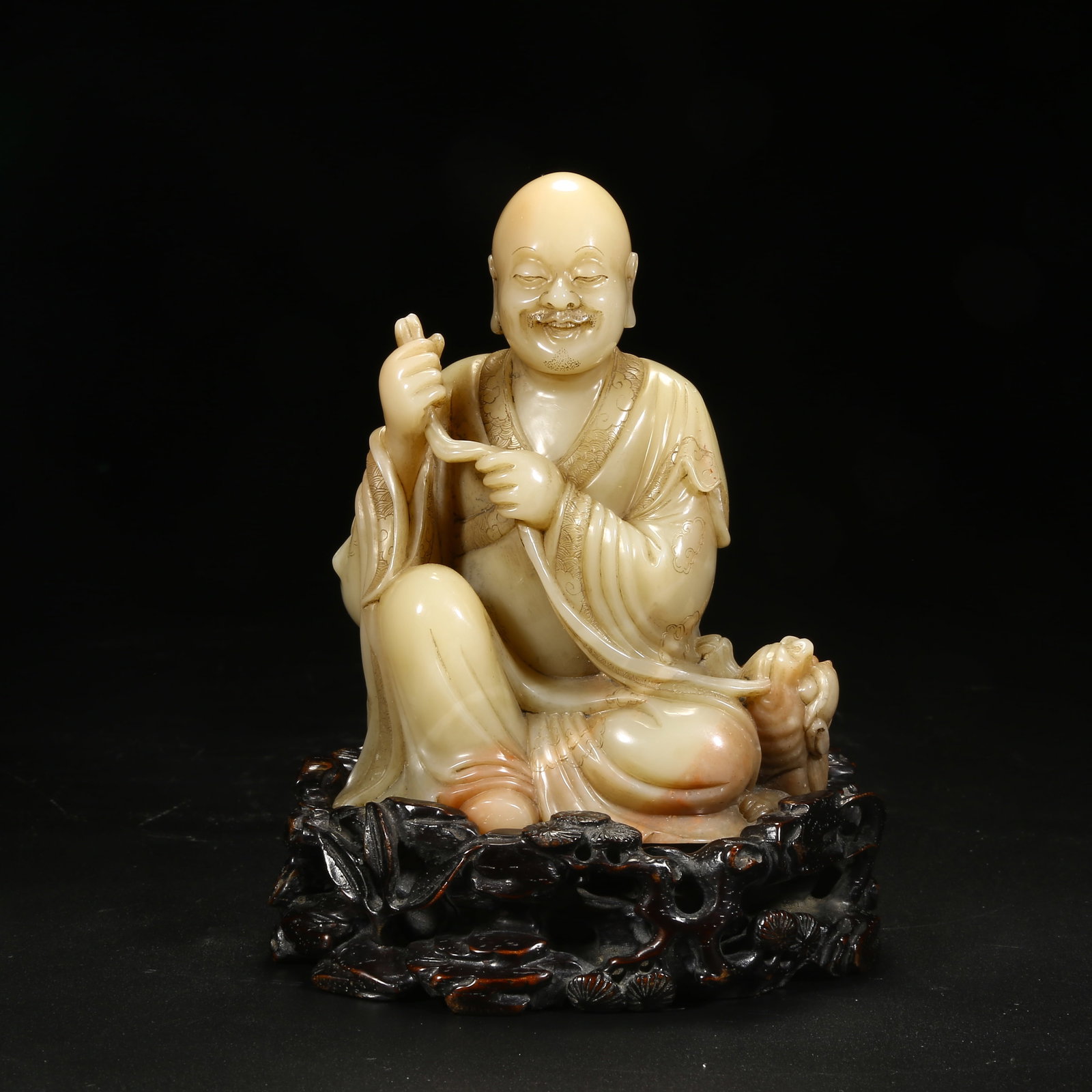 A SHOUSHAN STONE ARHAT FIGURINE (1 of 8)