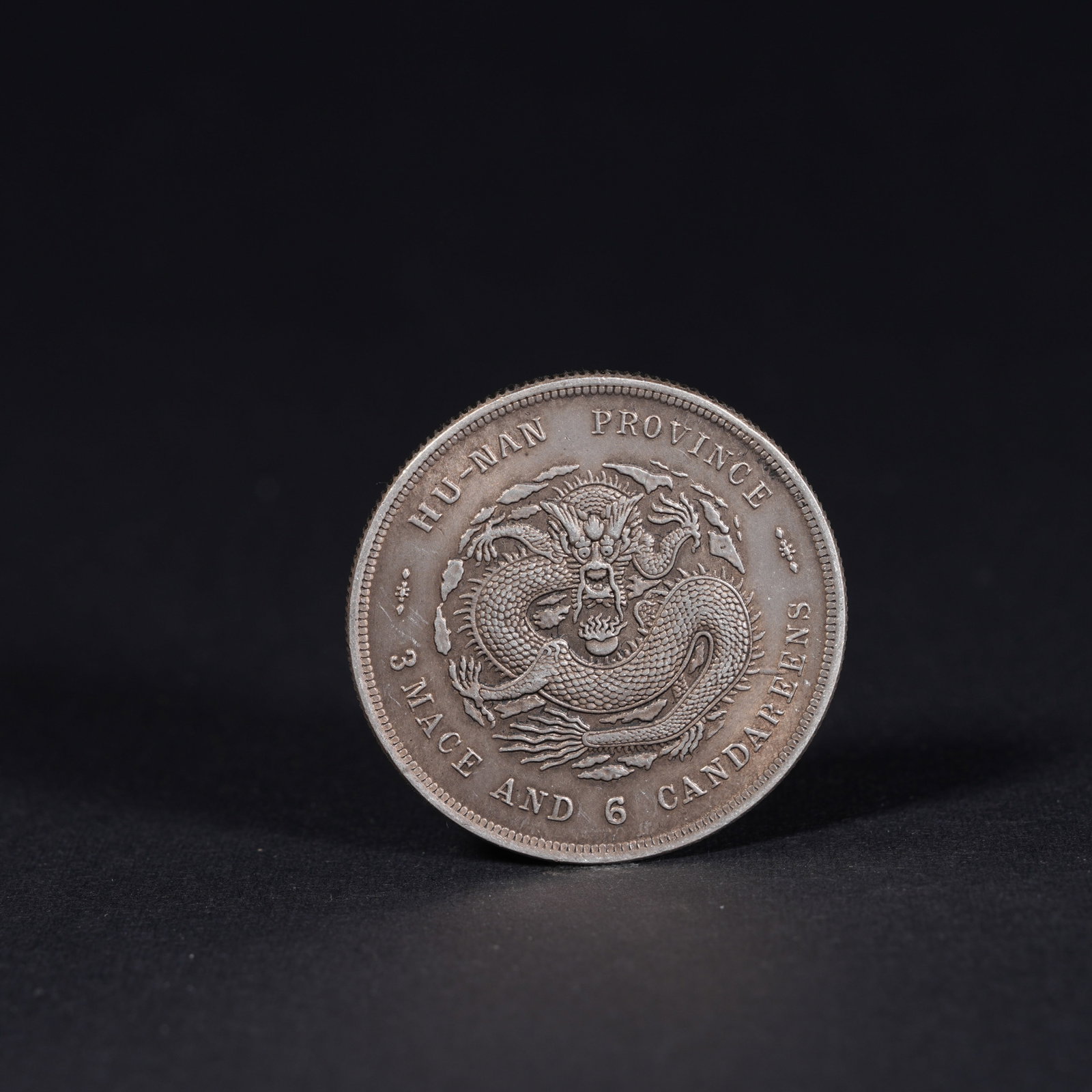 A SILVER DOLLAR COIN - 2