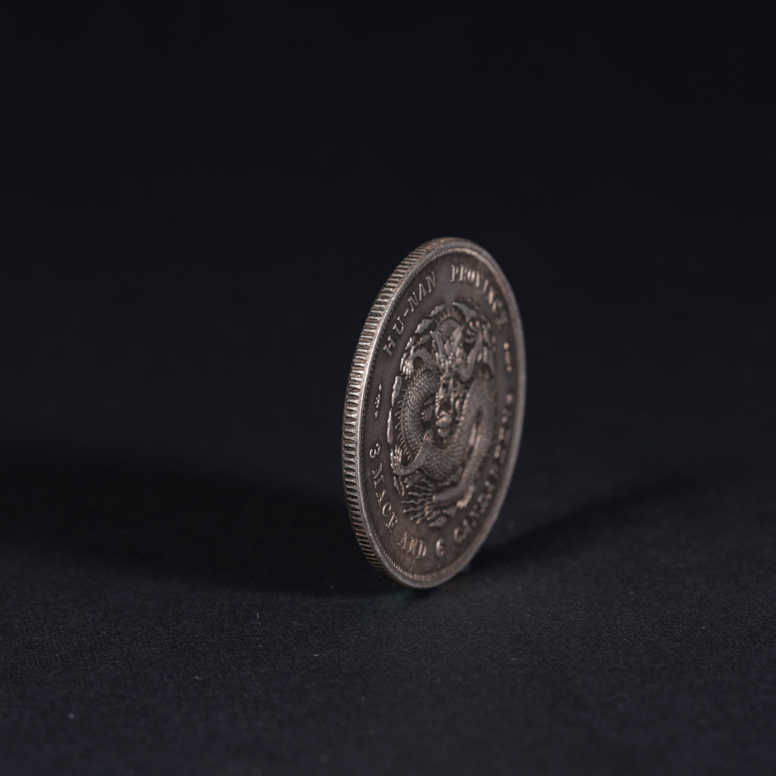 A SILVER DOLLAR COIN - 3