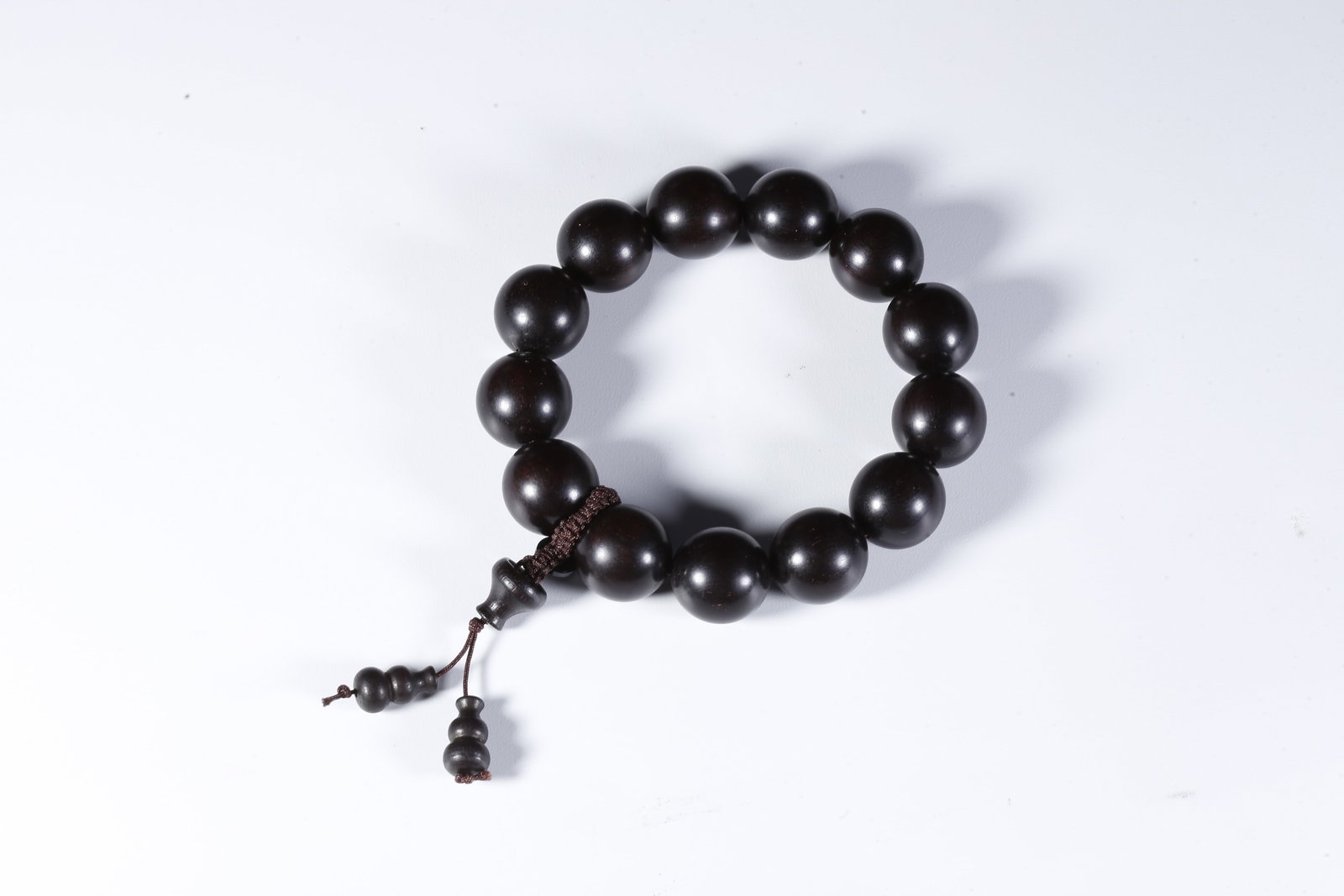 A ZITAN WOOD CARVED HAND STRING (1 of 9)