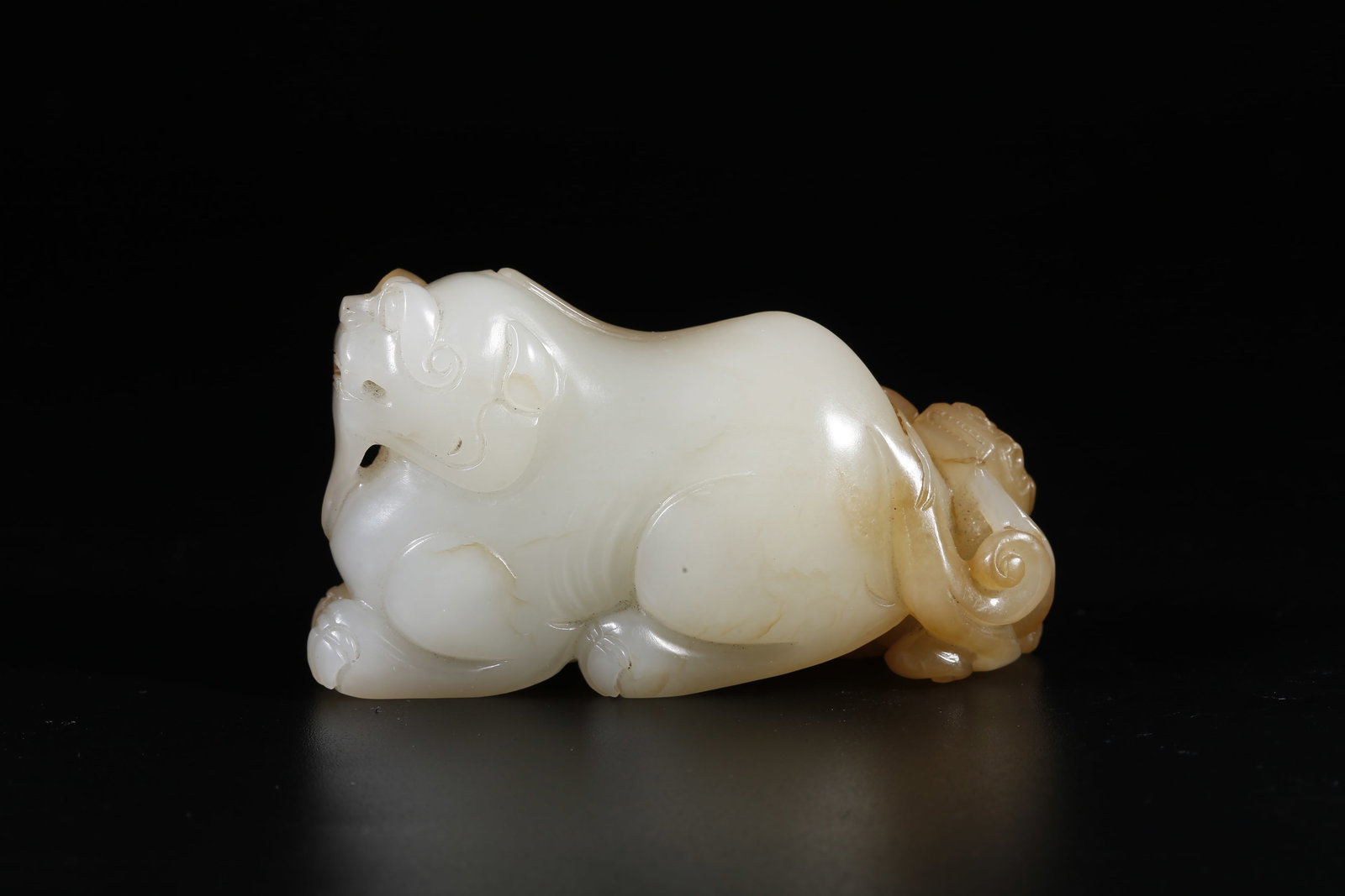 A HETIAN JADE ORNAMENT IN FORM OF ADULT AND YOUNG LIONS (1 of 9)