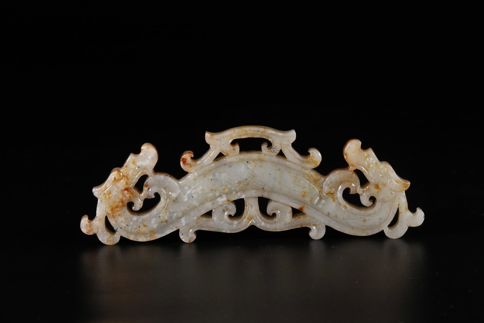 A HETIAN JADE DRAGON-SHAPED PENDANT (1 of 8)