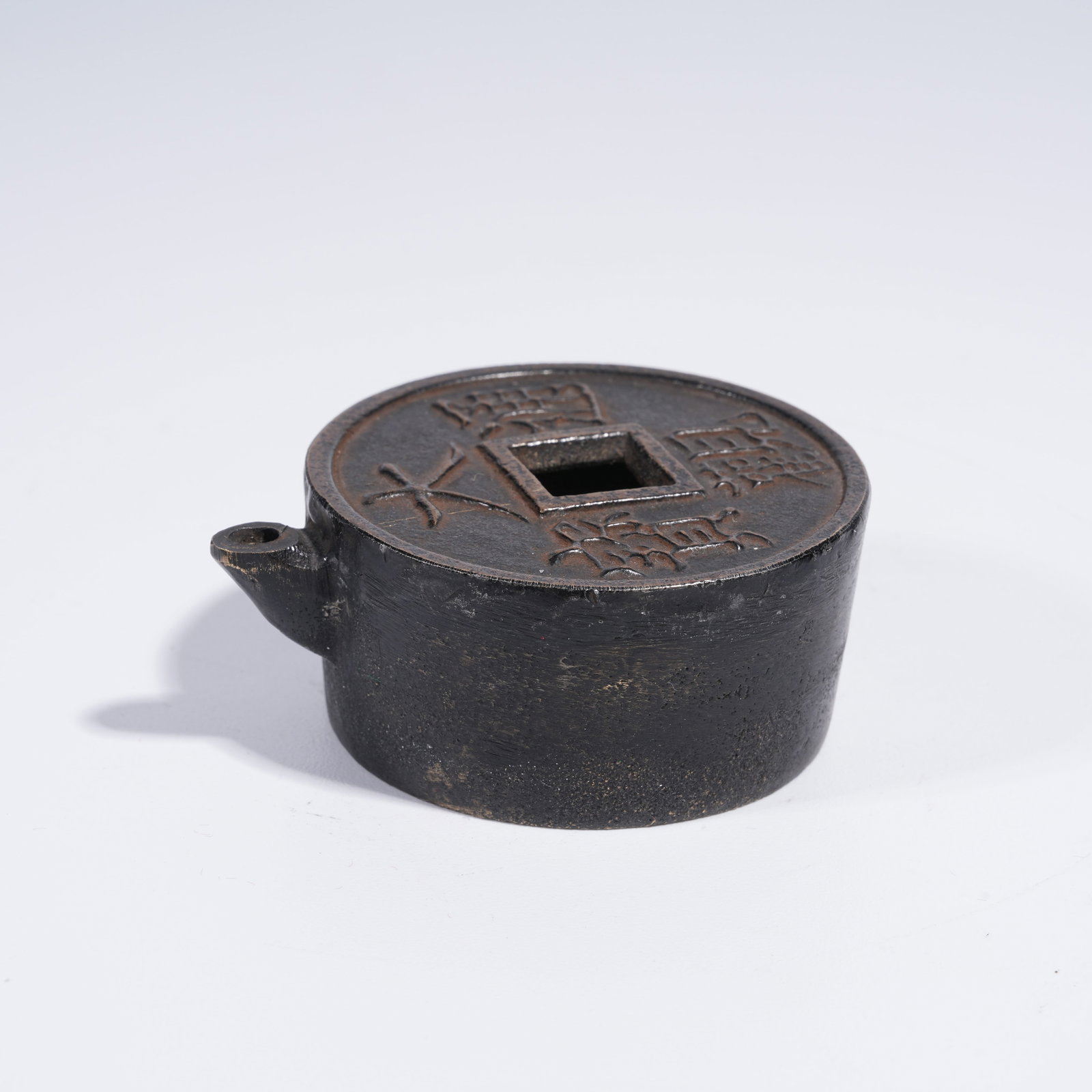 A BRONZE COIN-SHAPED WATER DROPPER (1 of 8)