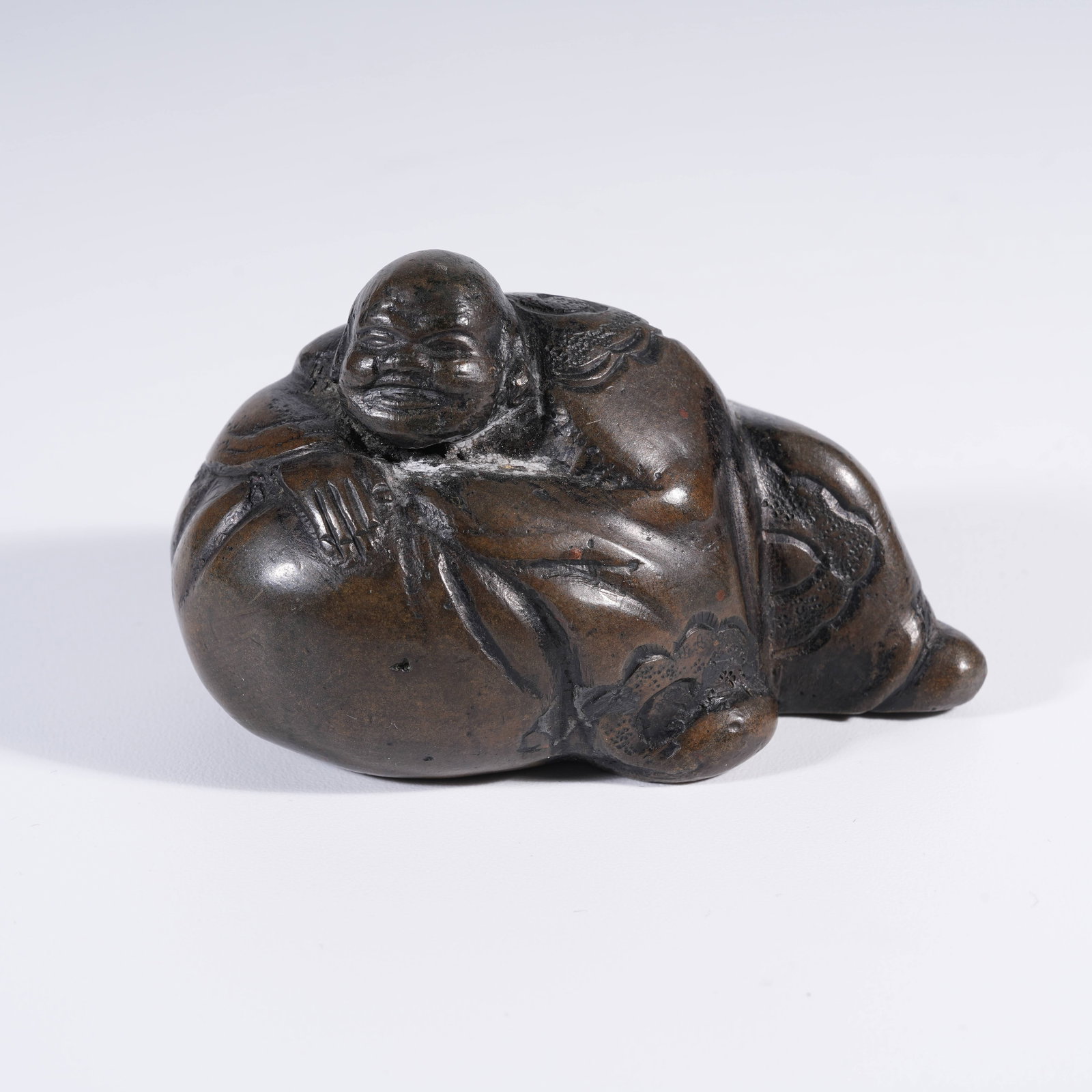 A BRONZE BUDAI MONK STATUE (1 of 8)