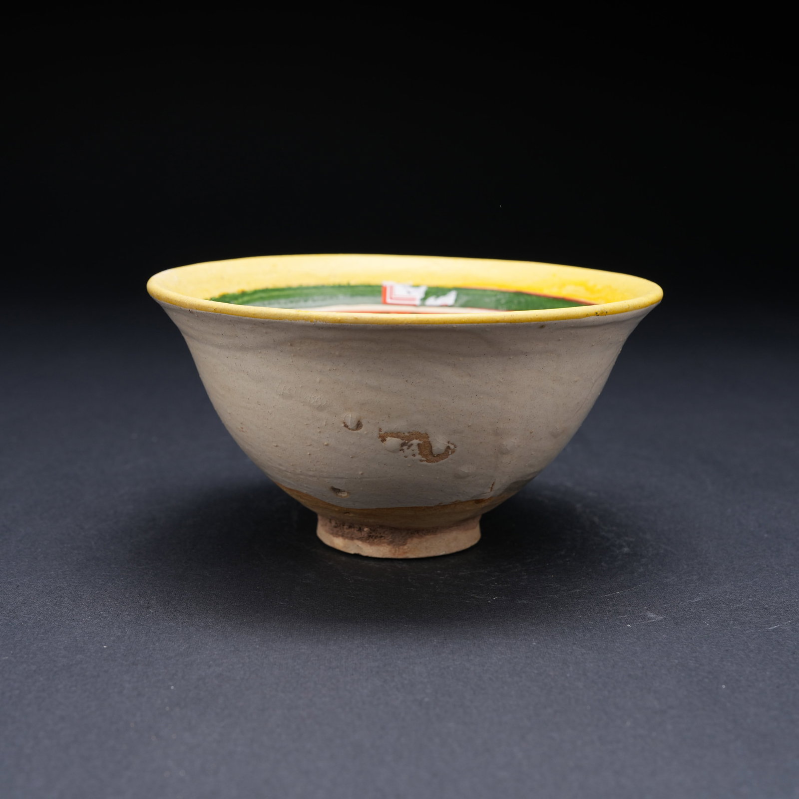 A TANG SANCAI BOWL WITH LOTUS POND AND CARP MOTIF (1 of 8)