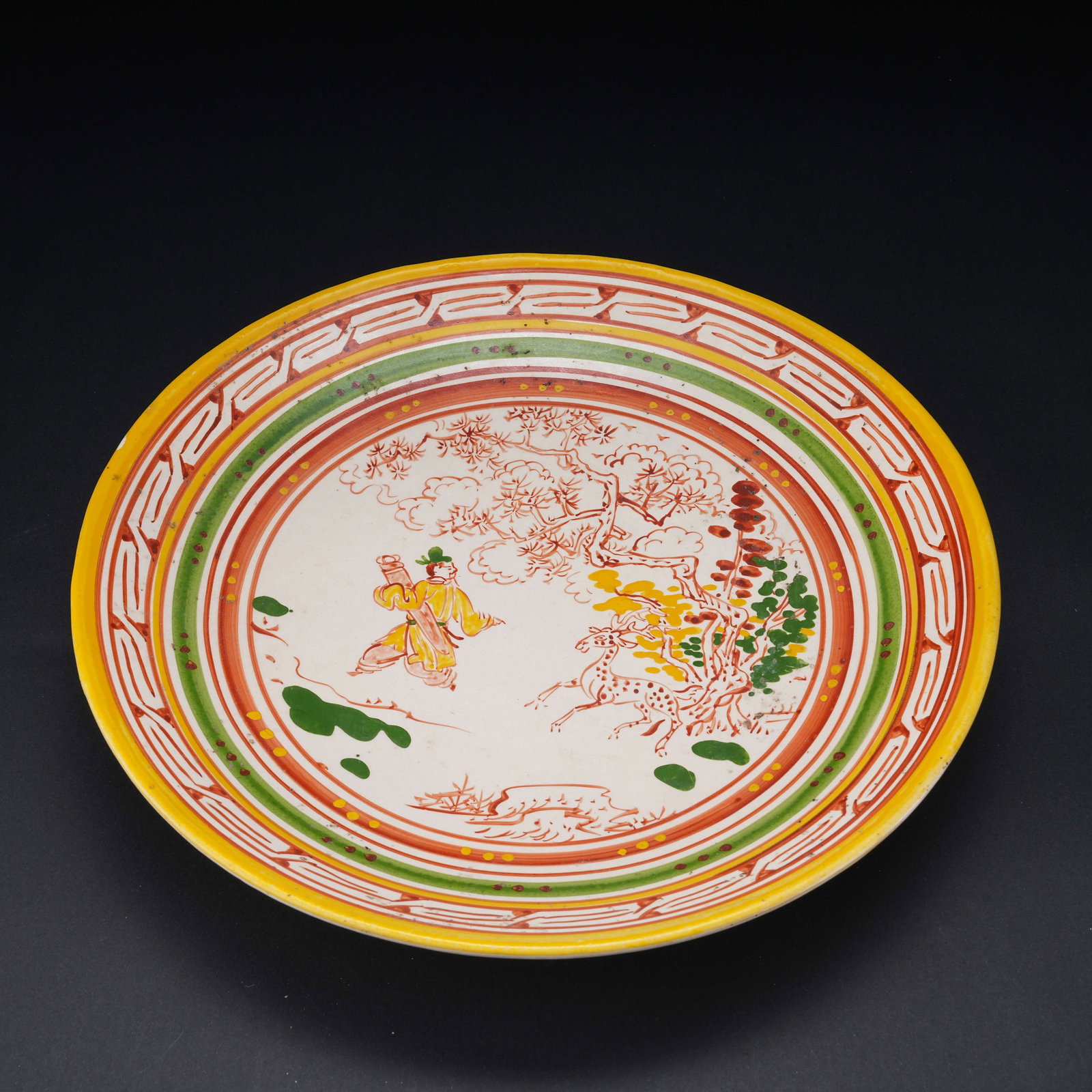 A TANG SANCAI DISH WITH FIGURES MOTIF: Tang Sancai Dish with Figures Motif