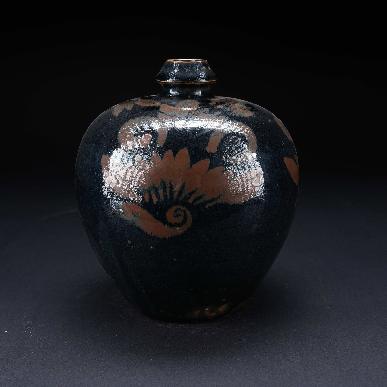 A BLACK GLAZED VASE WITH FLORAL PATTERN (1 of 9)