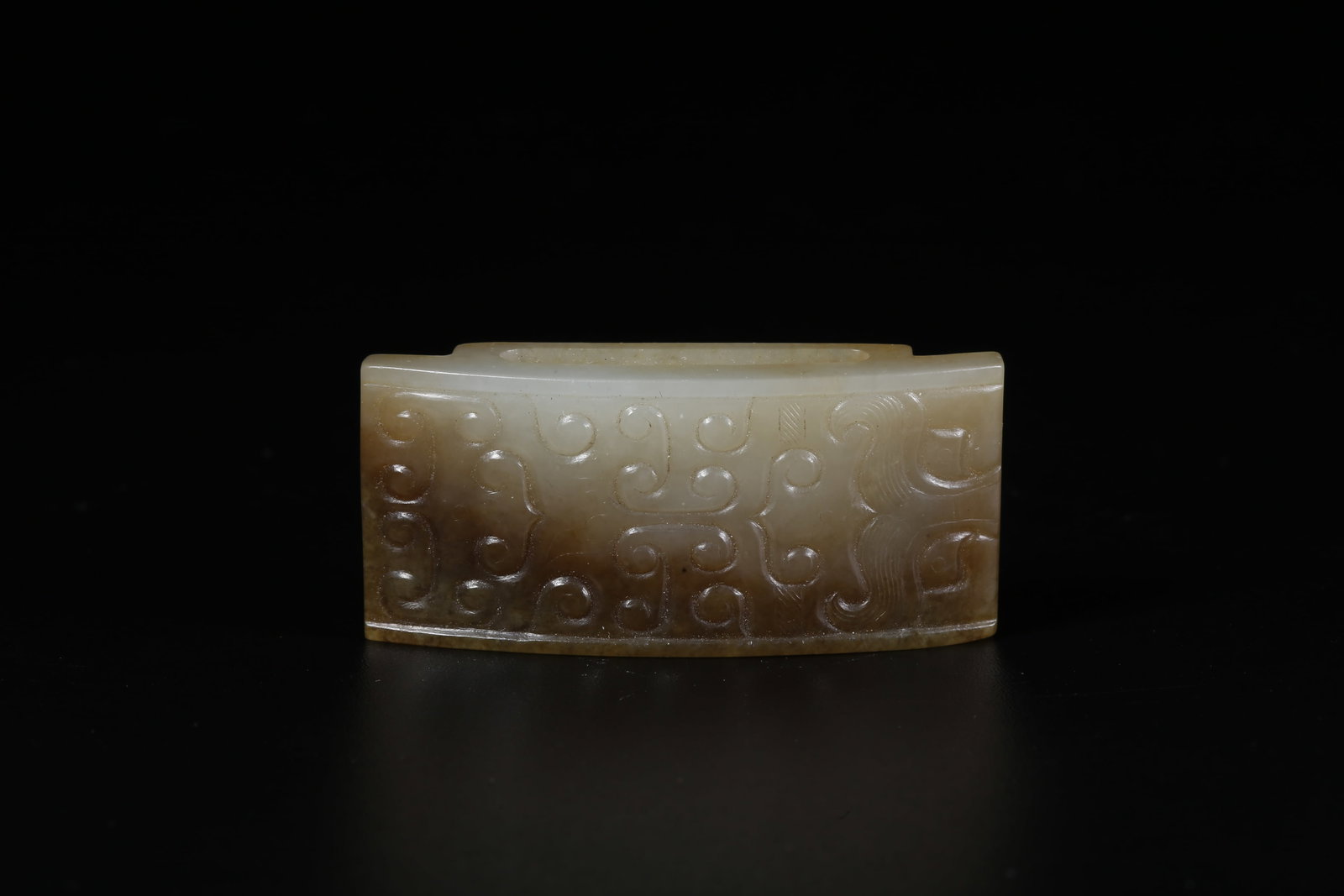 A HETIAN JADE CARVED BEAST-FACE PENDANT (1 of 9)