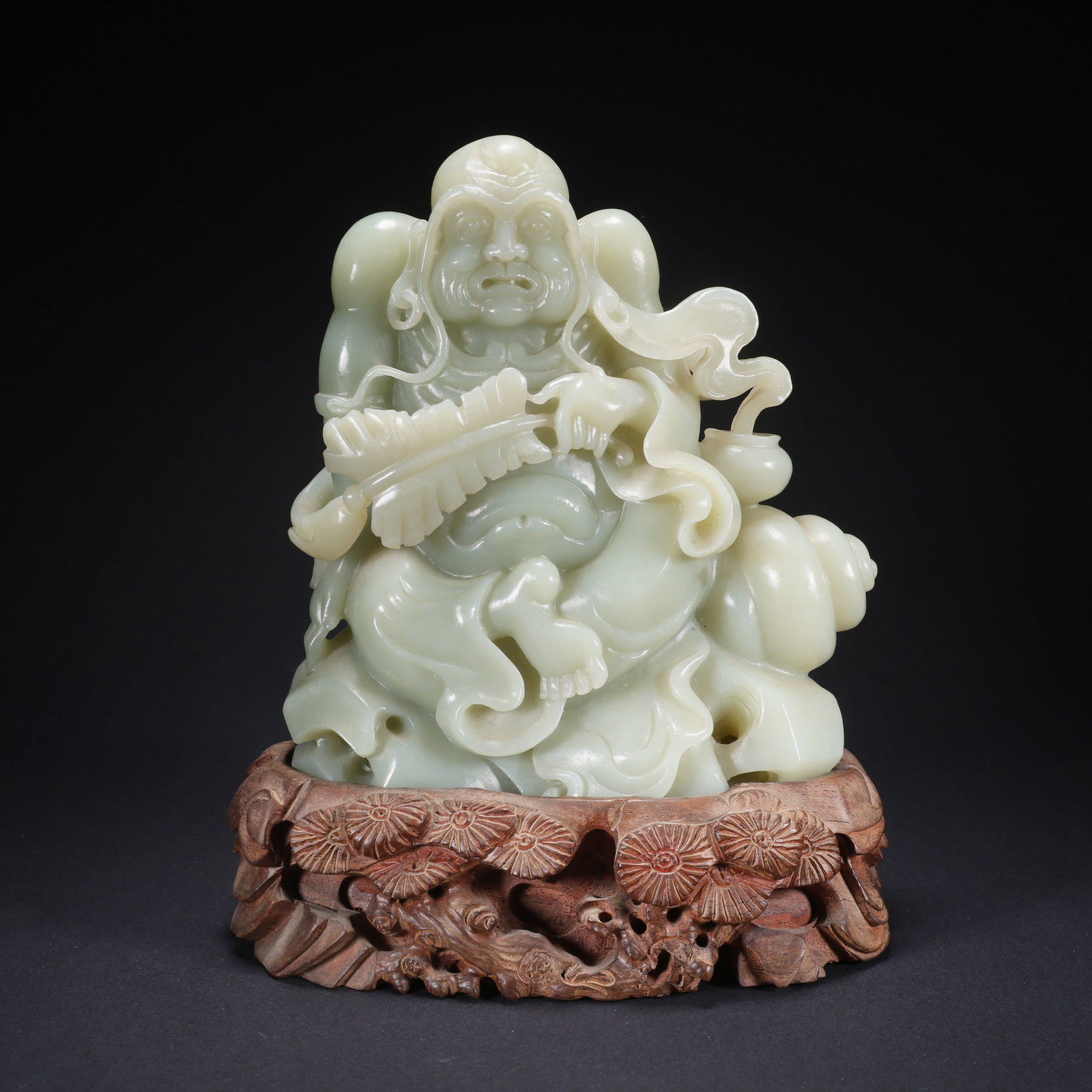 A HETIAN JADE ARHAT WITH BANANA TREE ORNAMENT ON WOODEN BASE (1 of 9)
