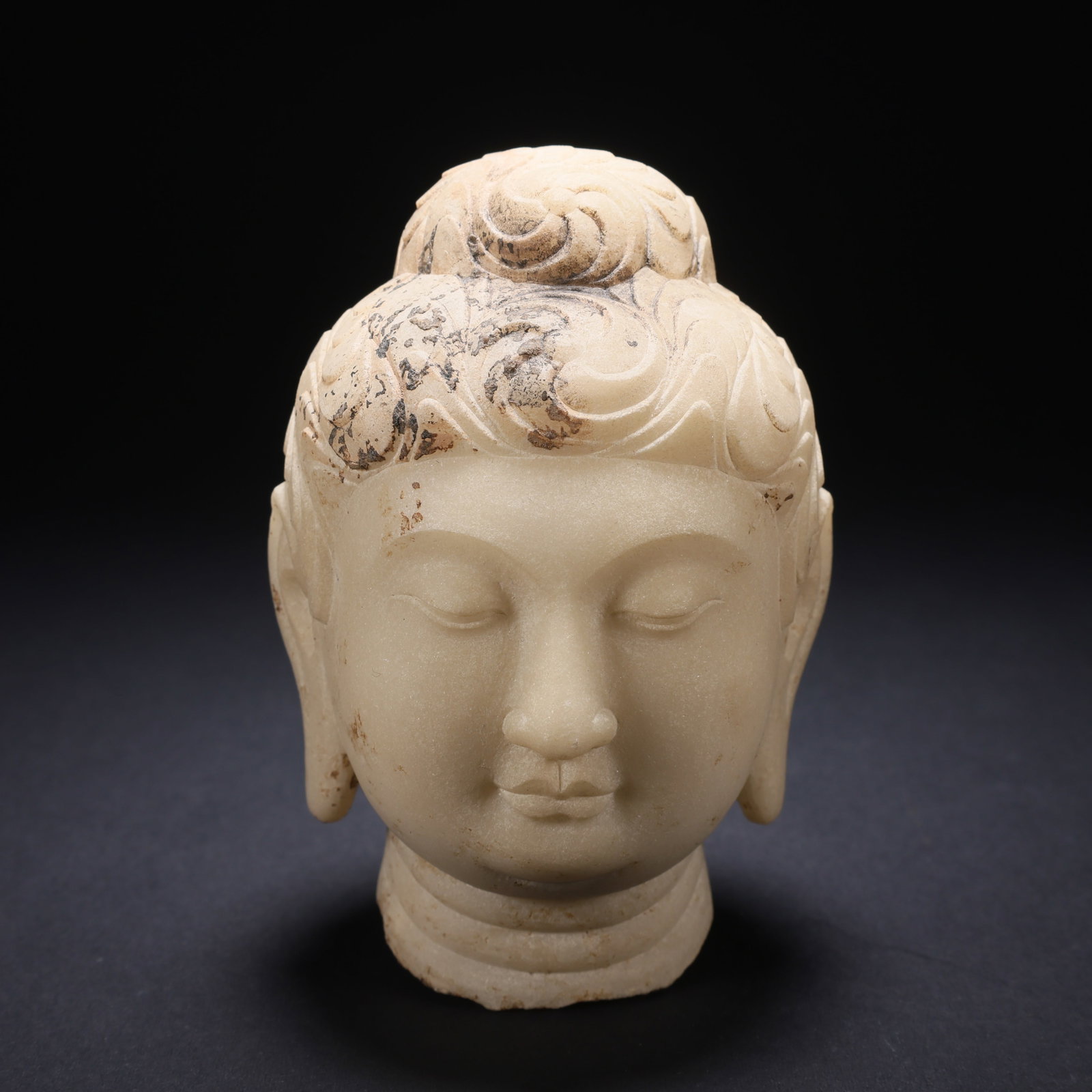 A WHITE MARBLE BUDDHA HEAD (1 of 9)