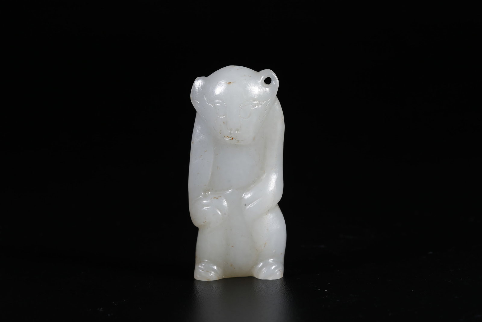 A HETIAN JADE PENDANT IN ANIMAL FORM (1 of 9)