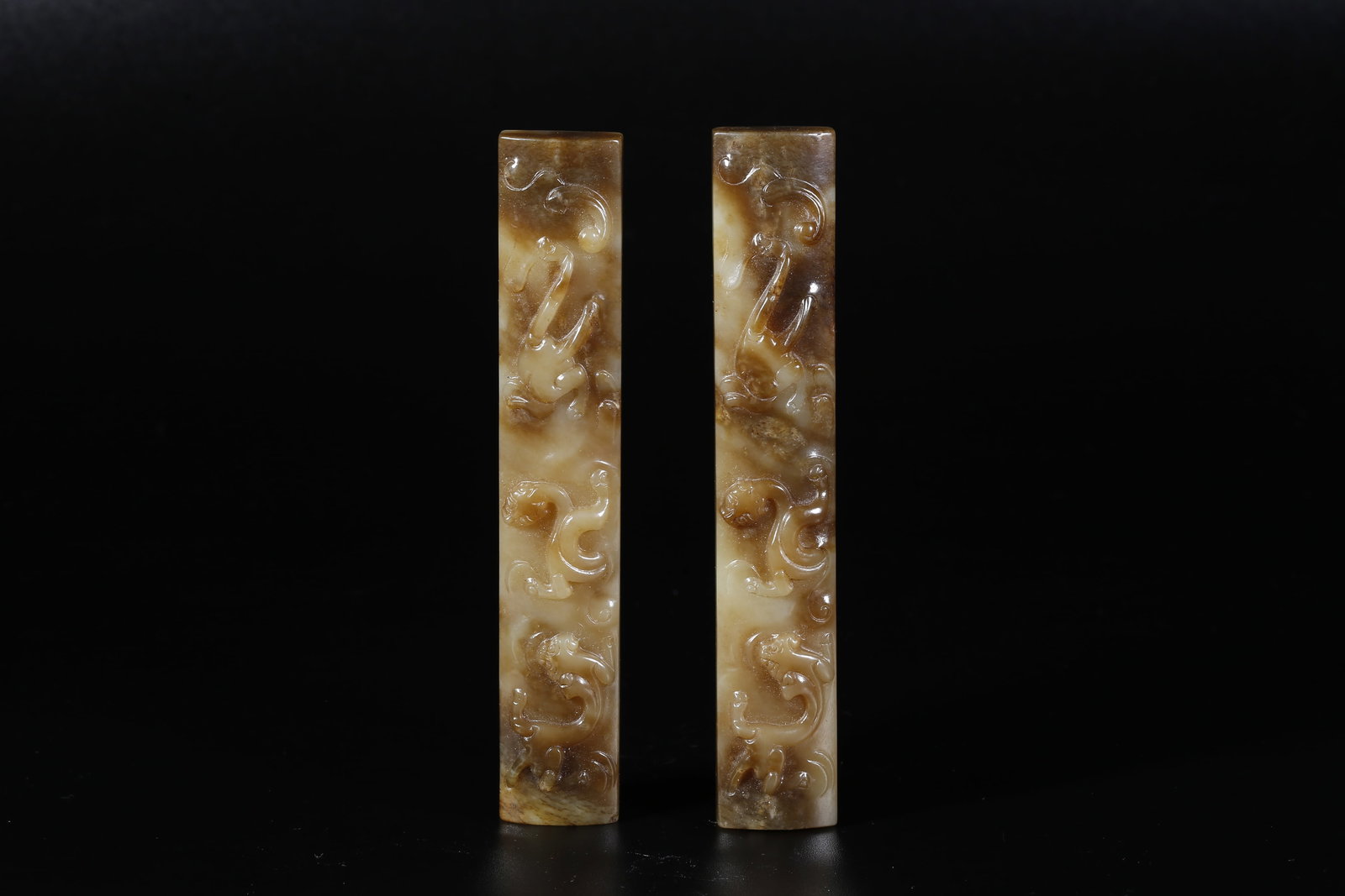 A HETIAN JADE CARVED DRAGON PAPERWEIGHTS (PAIR) (1 of 8)