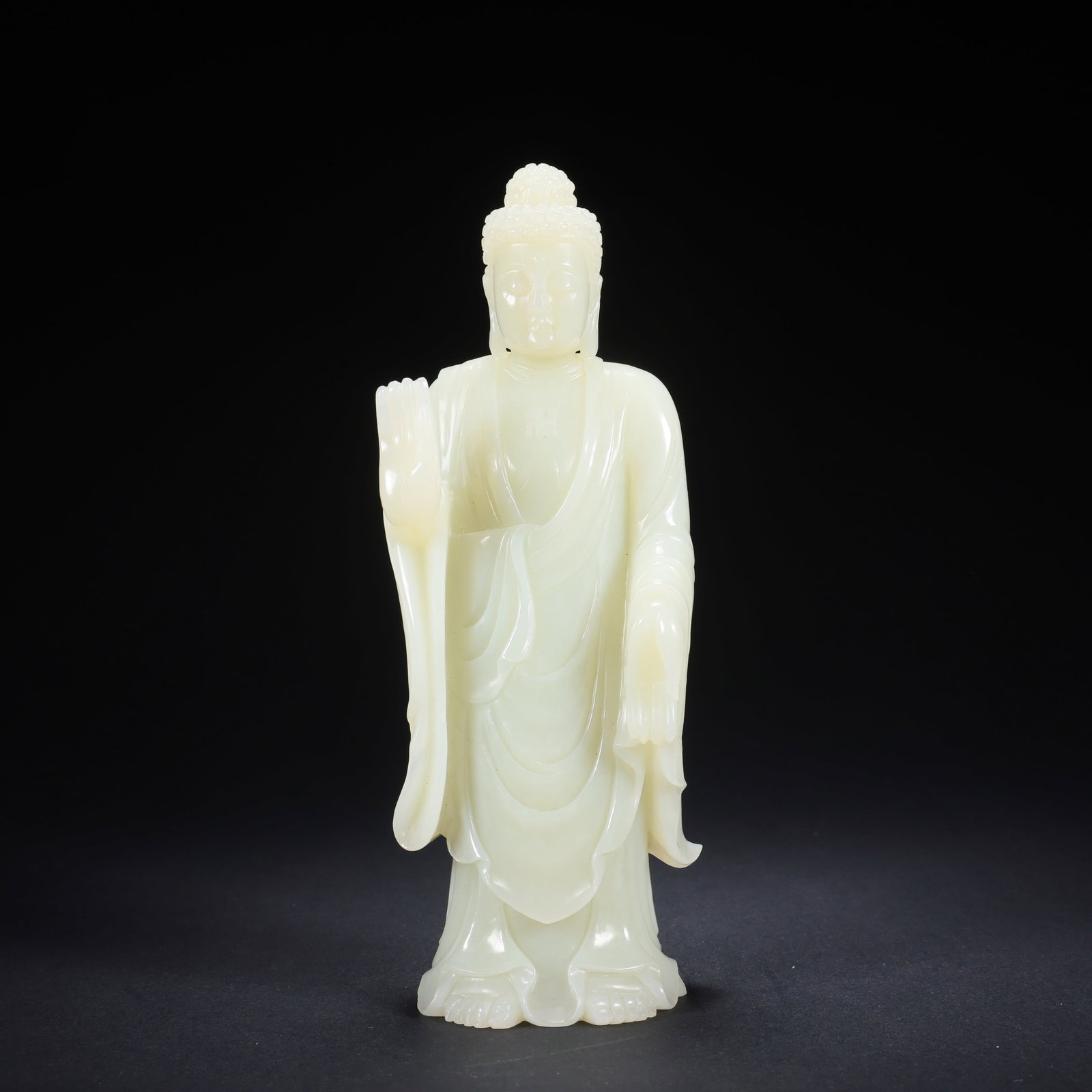 A HETIAN JADE BUDDHA (1 of 9)