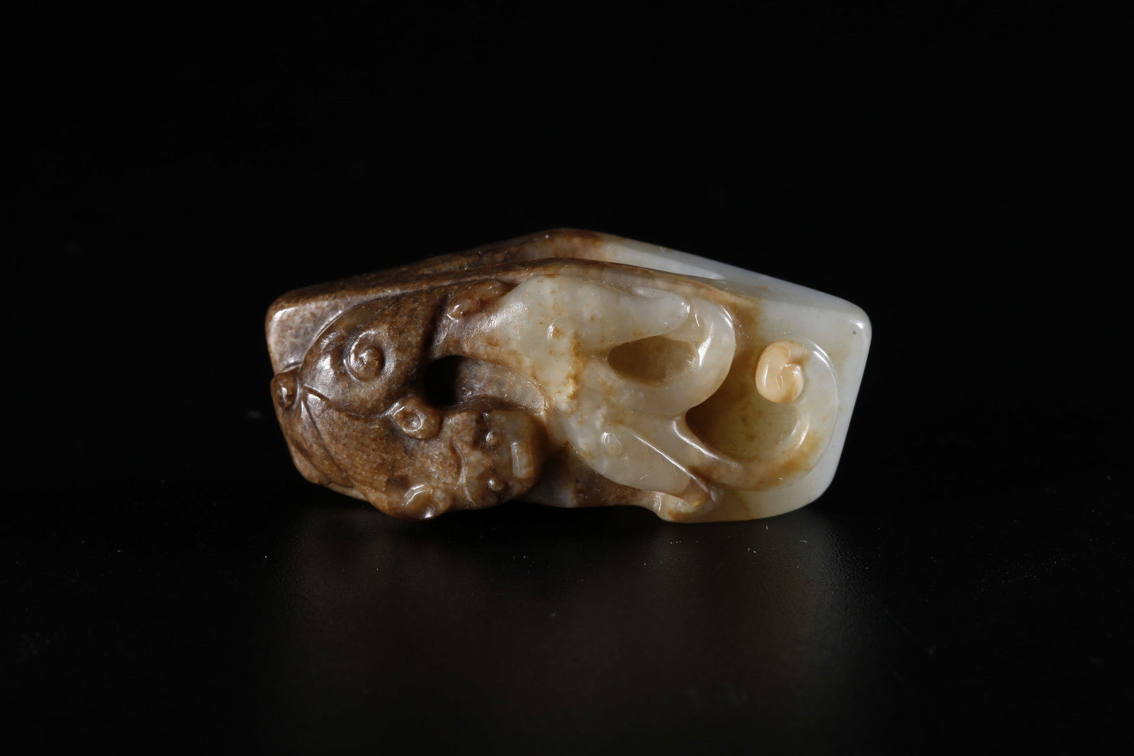 A HETIAN JADE CARVED DRAGON PENDANT (1 of 9)