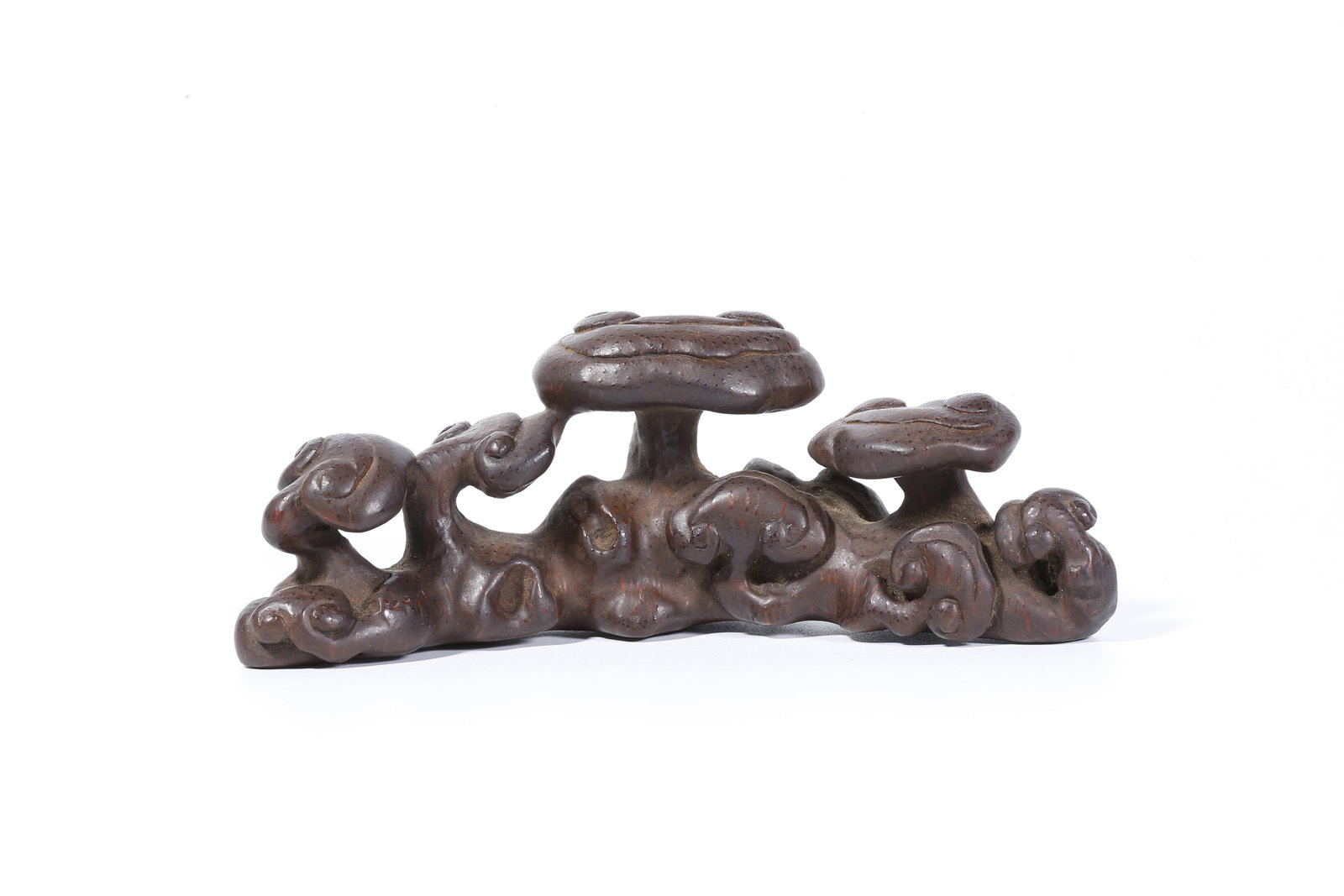 A BAMBOO-ROOT CARVED RUYI-SHAPED BRUSH HOLDER WITH LINGZHI FORM (1 of 9)
