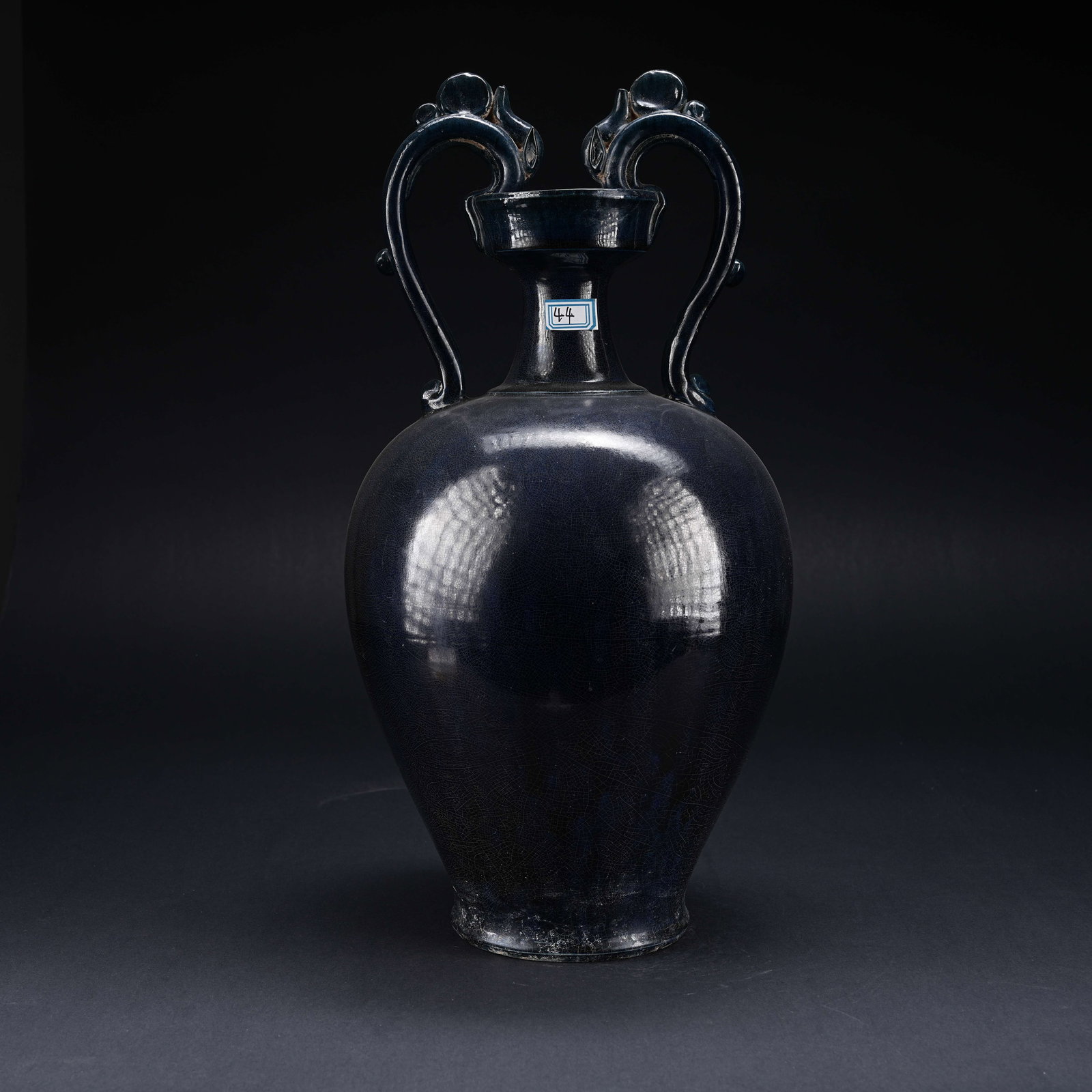 A DEEP BLUE GLAZED DOUBLE-DRAGON-HANDLED BOTTLE (1 of 9)
