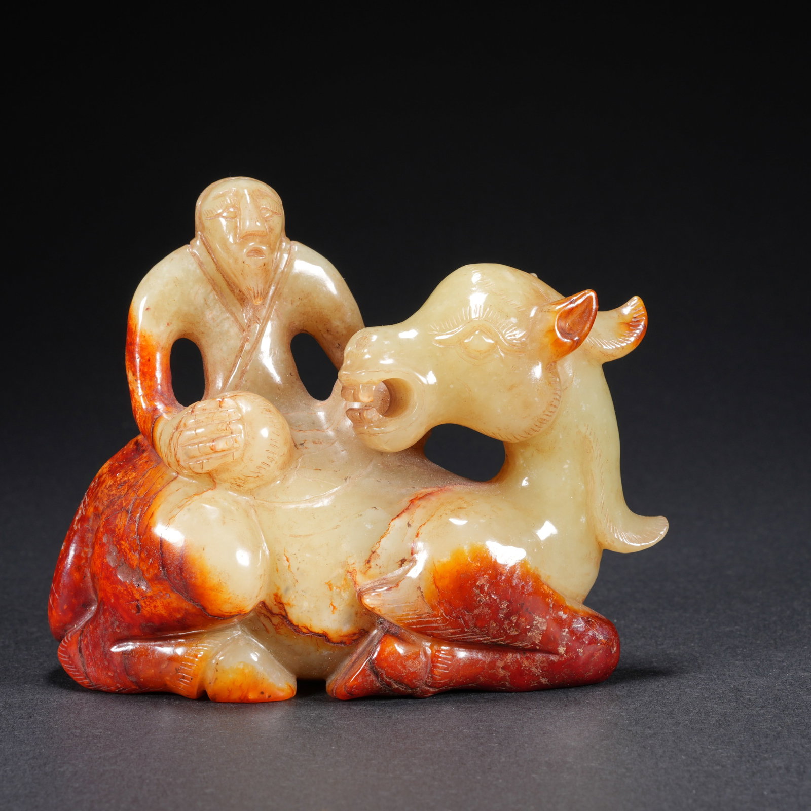 A HETIAN JADE CARVED ANIMAL-FORM FIGURE (1 of 9)