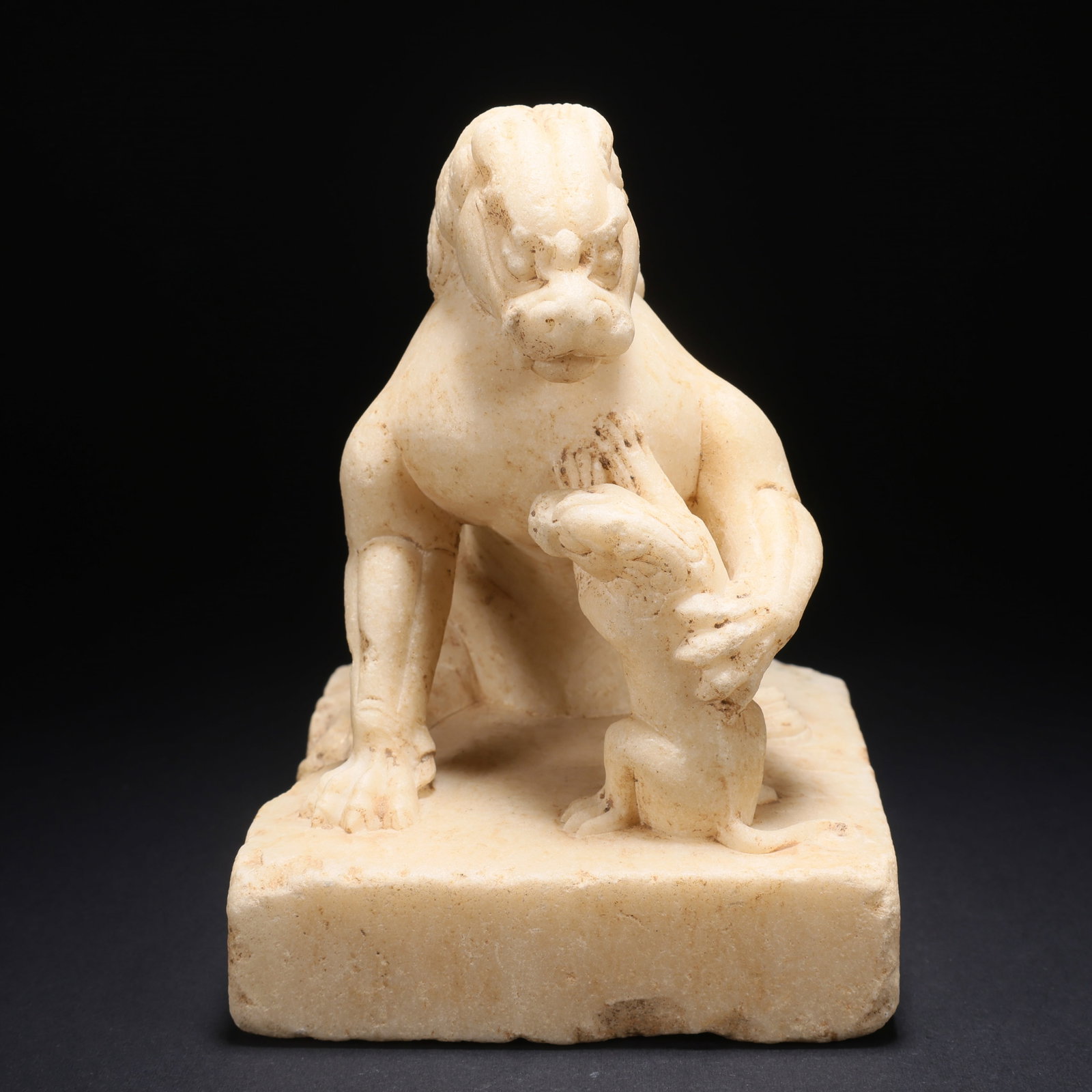 A WHITE MARBLE MOTHER-AND-CHILD LION (1 of 9)