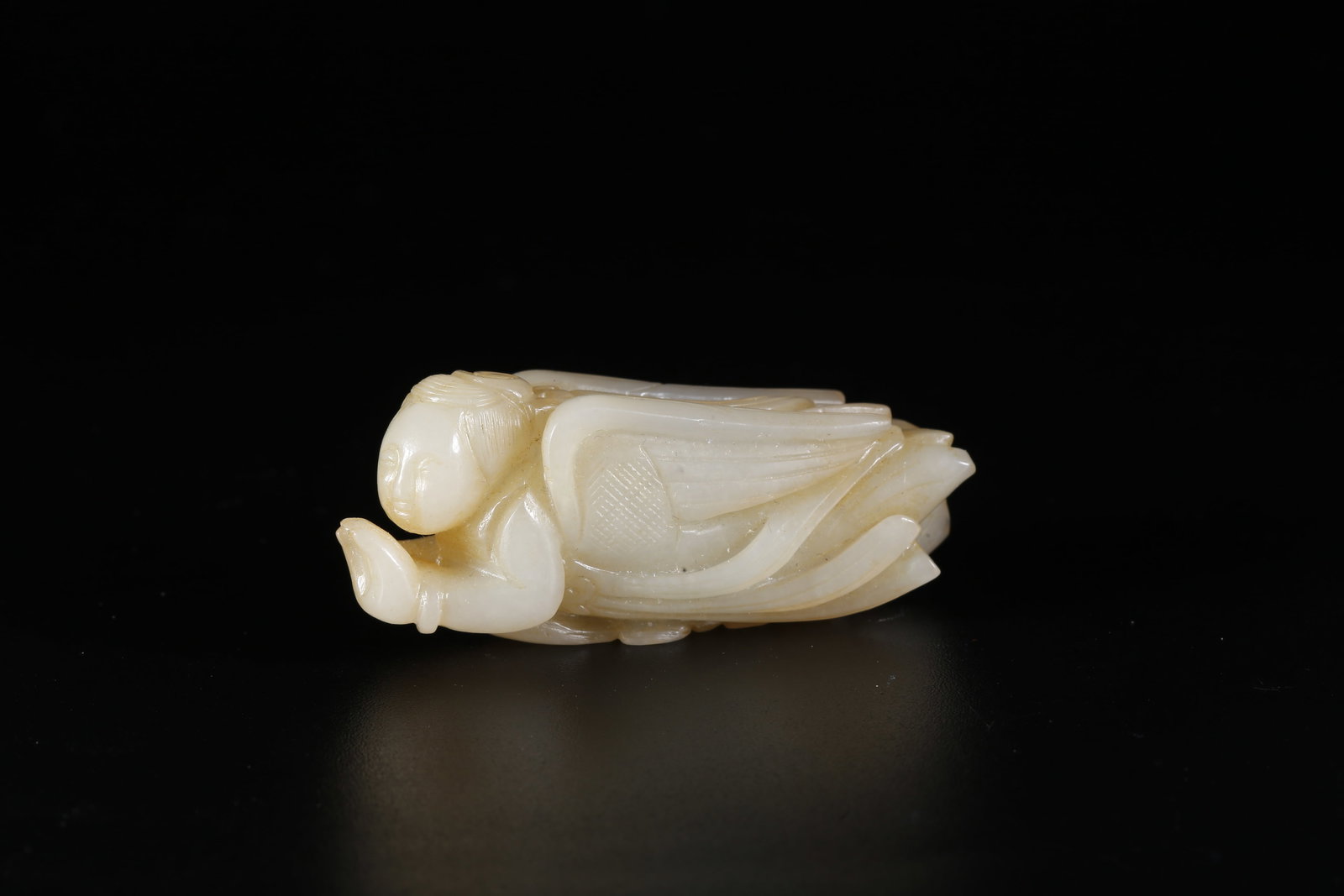 A HETIAN JADE CARVED FIGURE ORNAMENT (1 of 10)