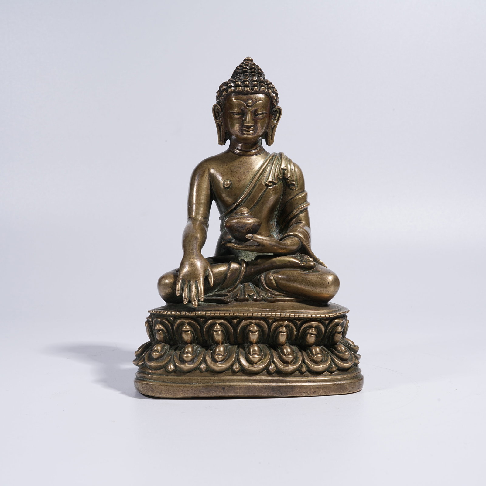A BRONZE MEDICINE BUDDHA STATUE (1 of 8)