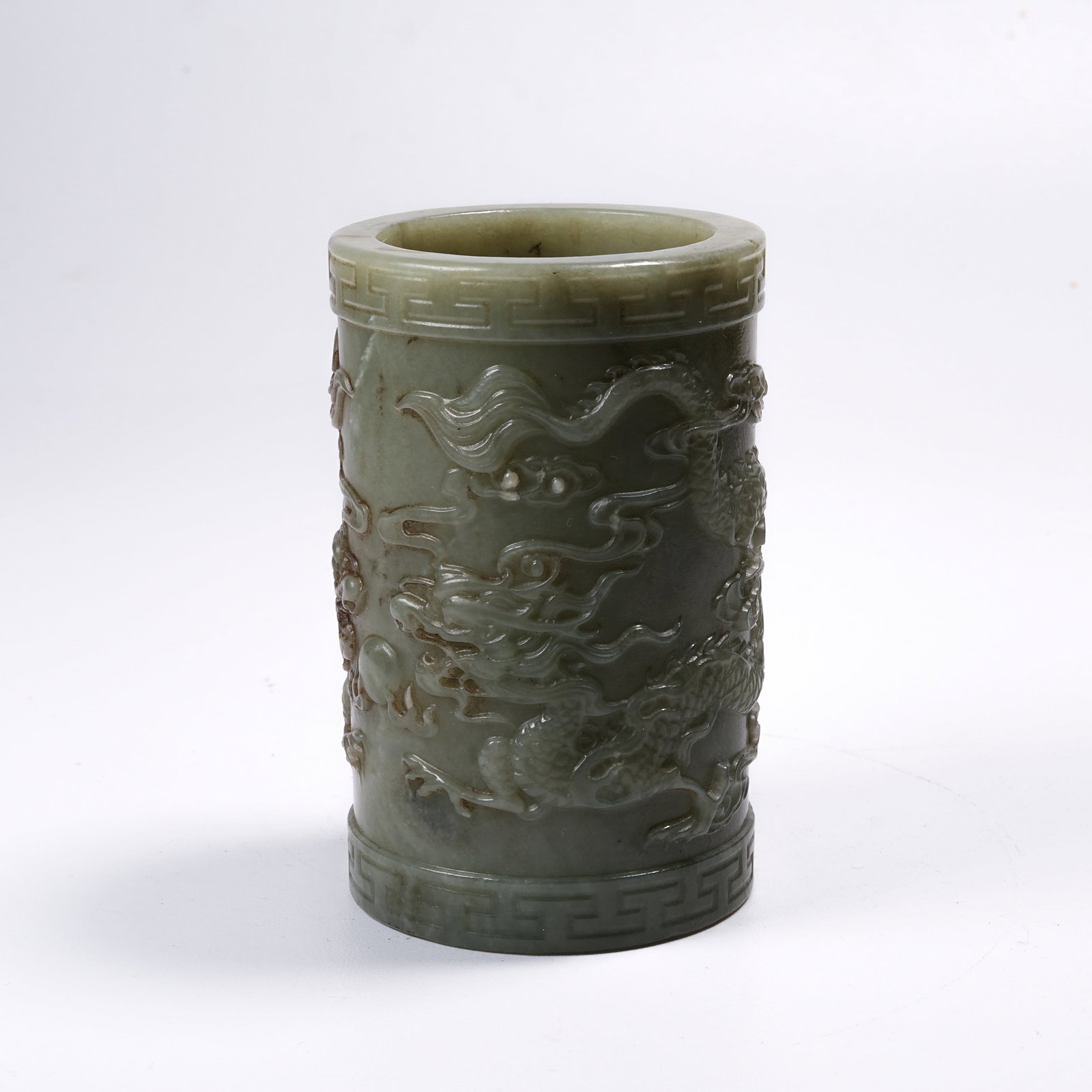A HETIAN JADE BRUSH HOLDER WITH "TWO DRAGONS PLAYING WITH A PEARL" MOTIF (1 of 9)