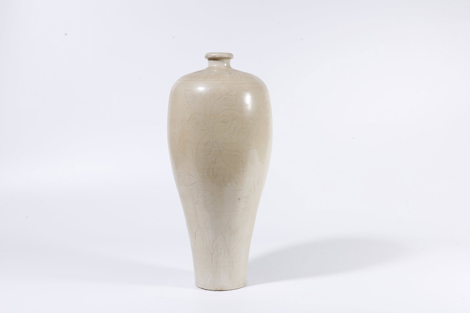 A DING WARE MEIPING VASE WITH FLORAL DECORATION: Ding Ware Meiping Vase with Floral Decoration