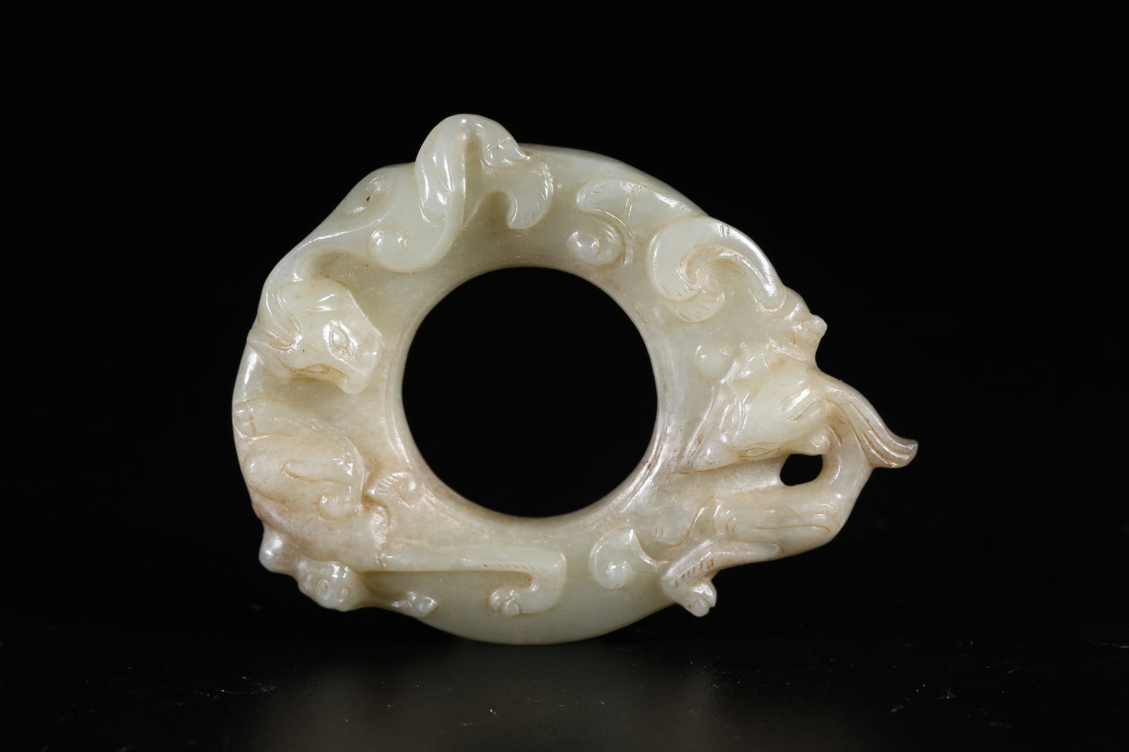 A HETIAN JADE BI DISC WITH DRAGON AND PHOENIX DECORATION: Hetian Jade Bi Disc with Dragon and Phoenix Decoration