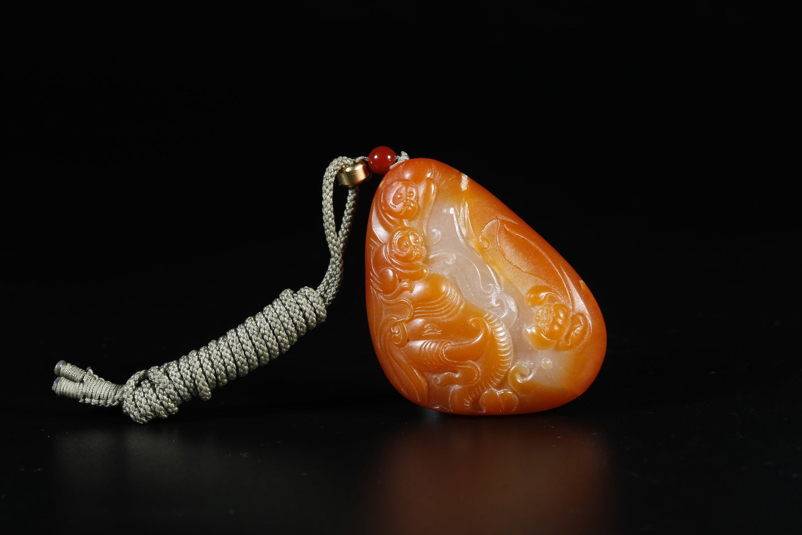 A HETIAN JADE PENDANT WITH "ELEPHANT OF GREAT PEACE" MOTIF: Hetian Jade Pendant with "Elephant of Great Peace" Motif