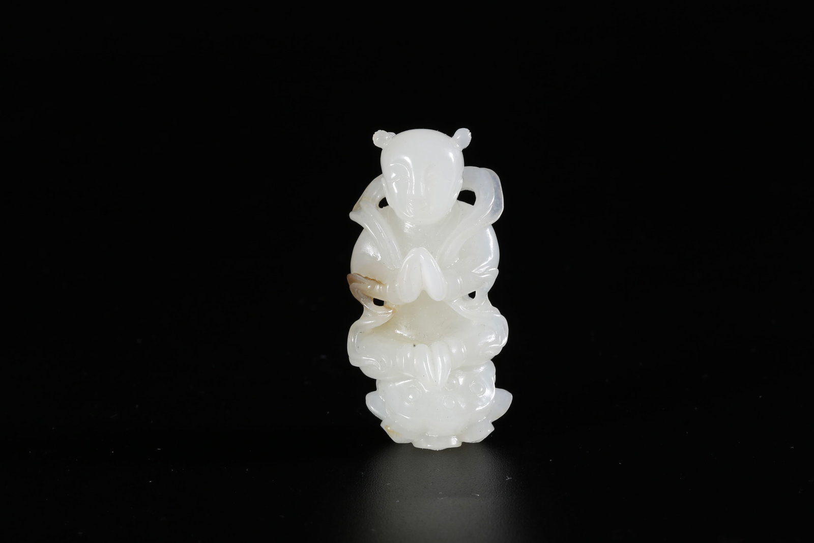 A HETIAN JADE CARVED CHILD FIGURE ORNAMENT (1 of 9)