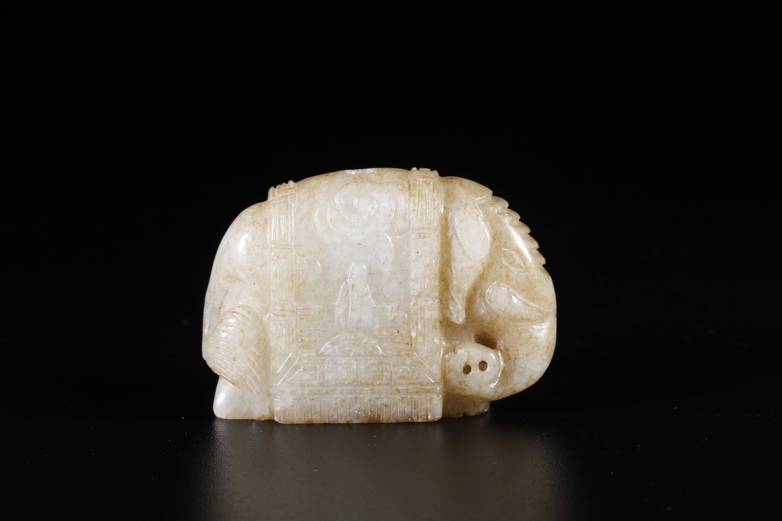 A HETIAN JADE ORNAMENT WITH "ELEPHANT OF GREAT PEACE" MOTIF (1 of 10)
