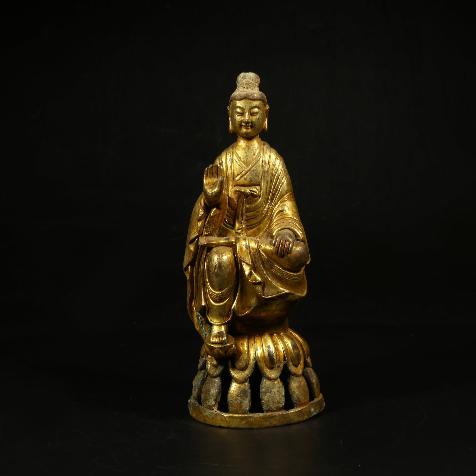 A GILT-BRONZE FIGURE OF GUANYIN (1 of 8)