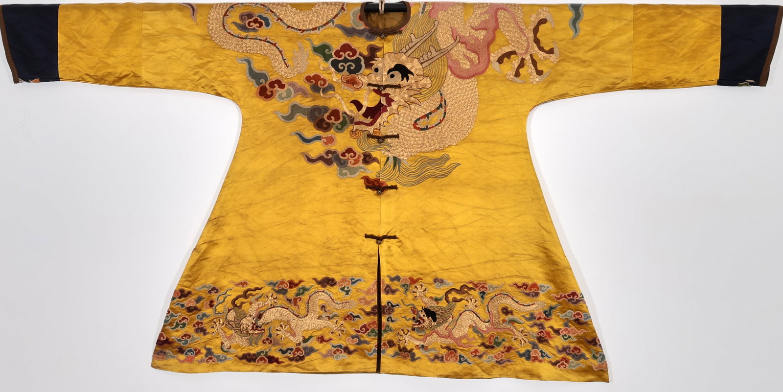 A QING DYNASTY BRIGHT YELLOW SATIN GROUND SEED-STITCH EMBROIDERED DRAGON FRONT-CLOSURE JACKET (1 of 9)