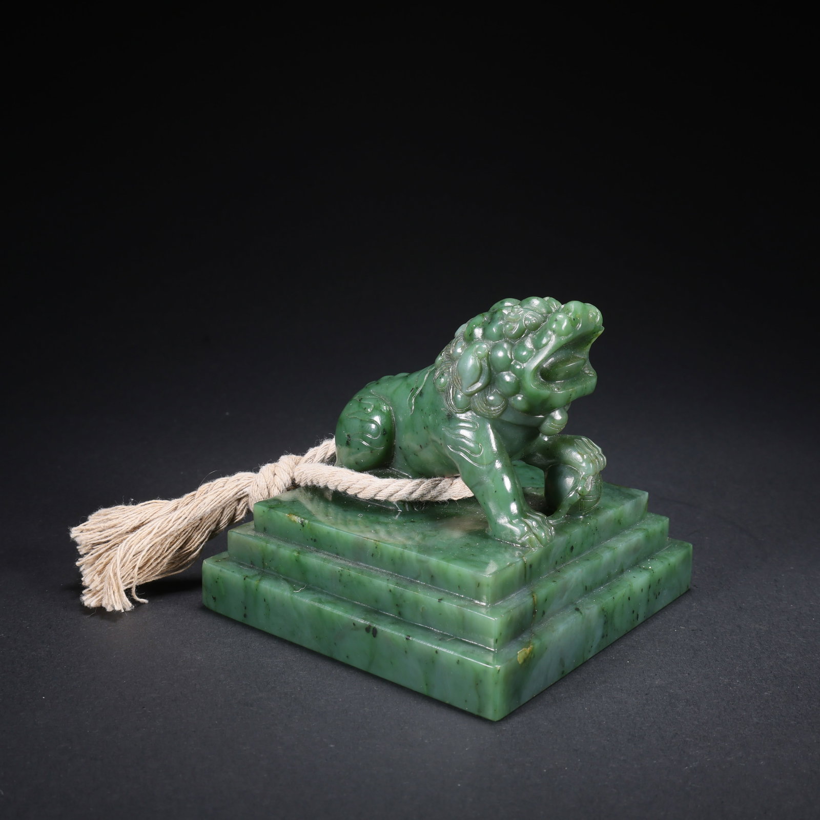 A HETIAN JASPER STEPPED SEAL WITH LION KNOB: Hetian Jasper Stepped Seal with Lion Knob