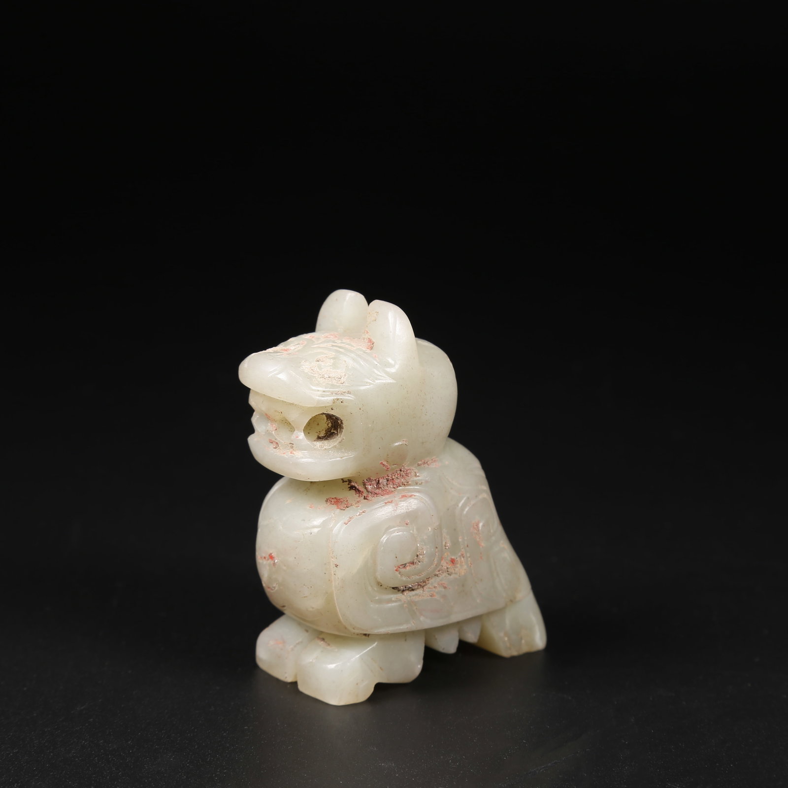 A ARCHAIC JADE MYTHICAL BEAST PENDANT (1 of 8)
