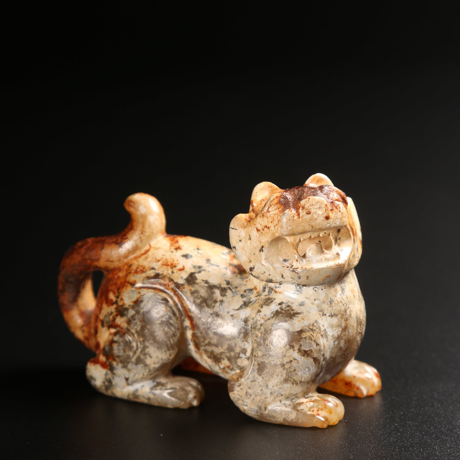 A ANCIENT JADE AUSPICIOUS BEAST ORNAMENT (1 of 10)