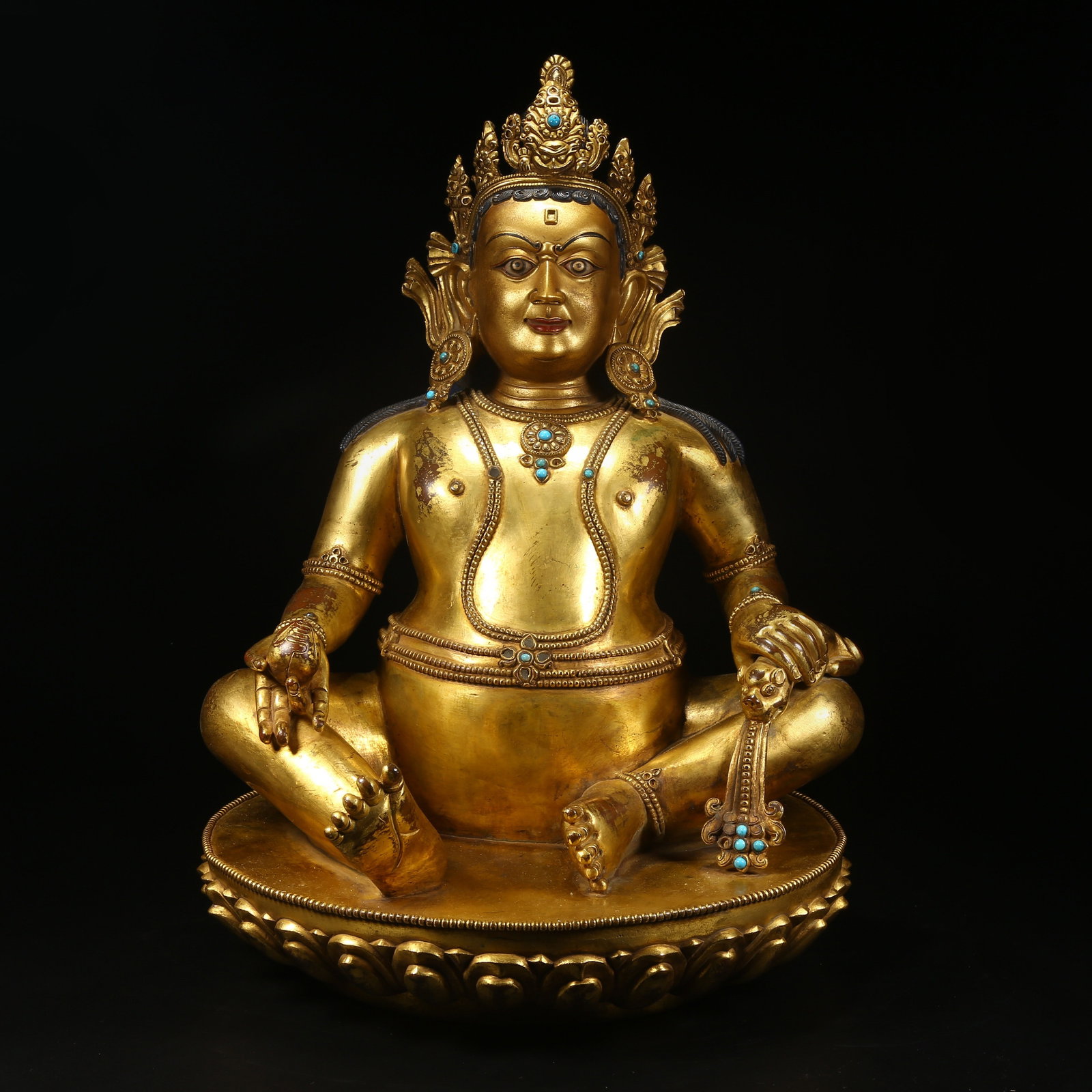 A GILT BRONZE STATUE OF YELLOW JAMBHALA (WEALTH DEITY) (1 of 8)