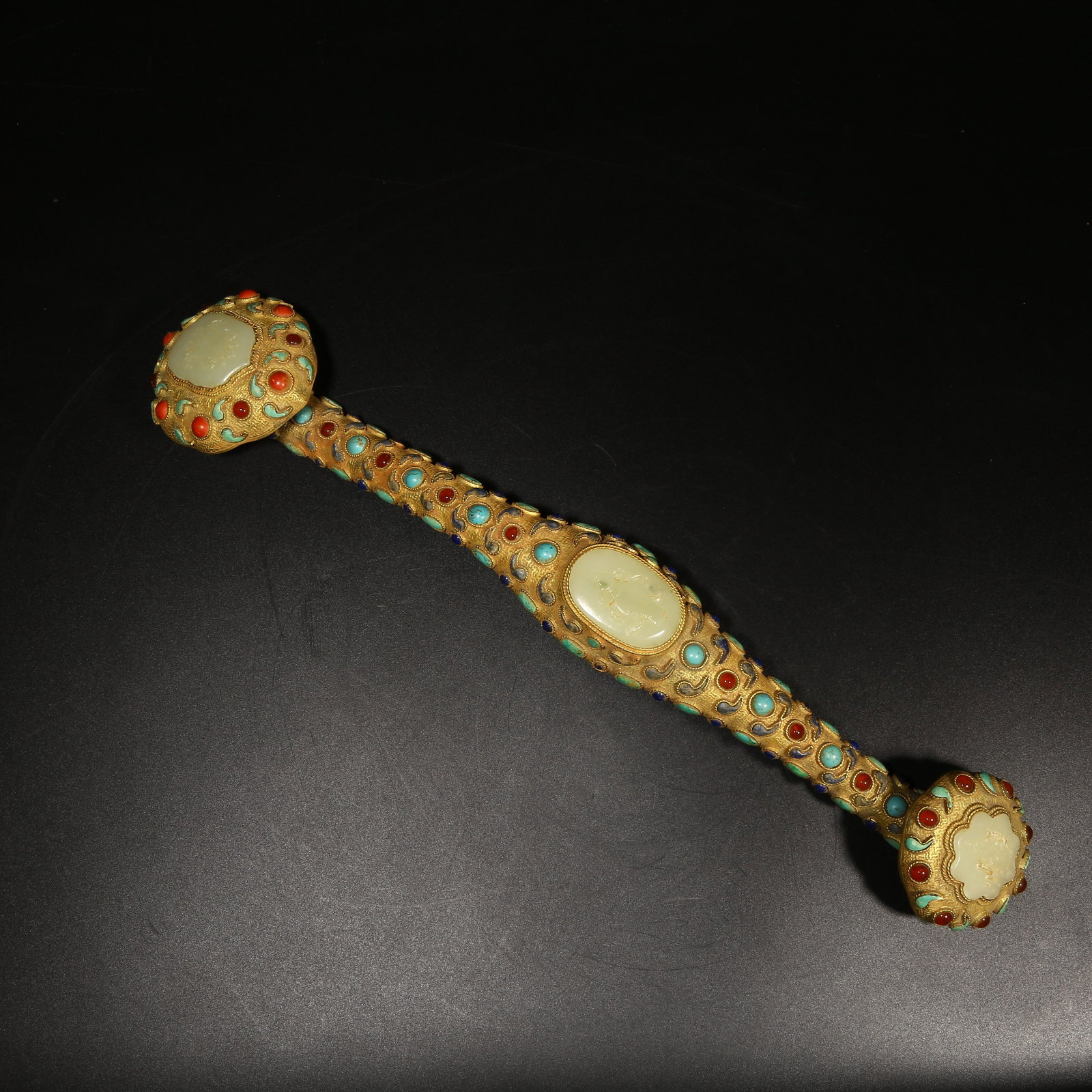 A GILT-BRONZE AND GEM-INLAID RUYI SCEPTER (1 of 5)