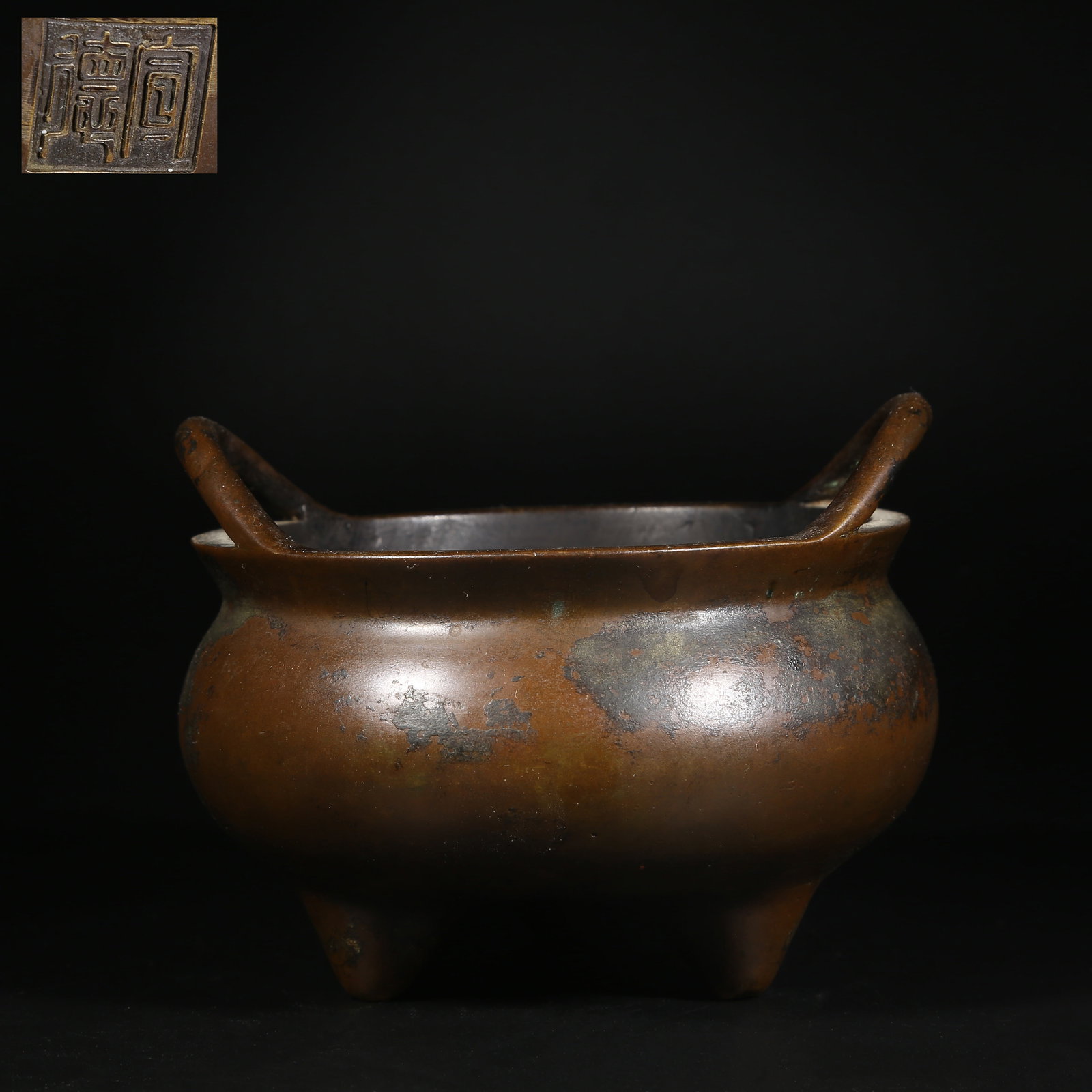 A BRONZE TRIPOD BRIDGE-HANDLED CENSER (1 of 10)